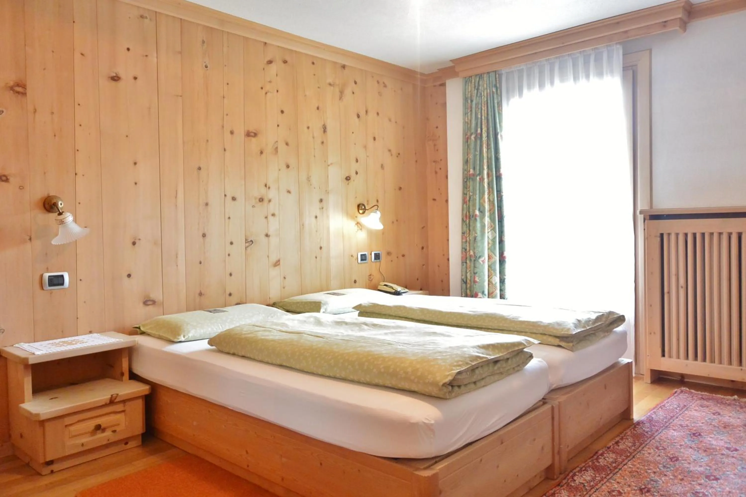 Bed in Hotel Garnì al Plan