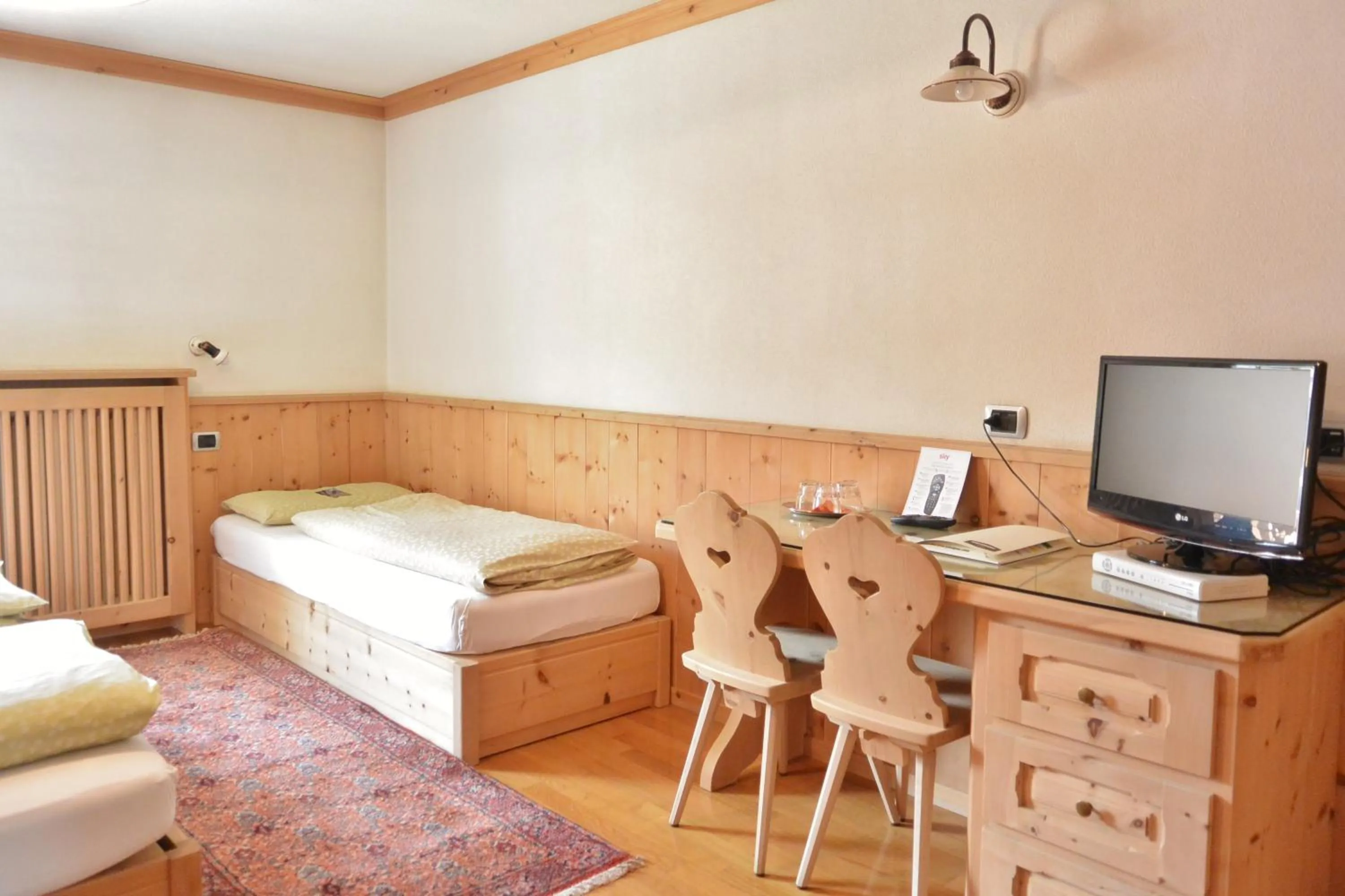 Bed in Hotel Garnì al Plan