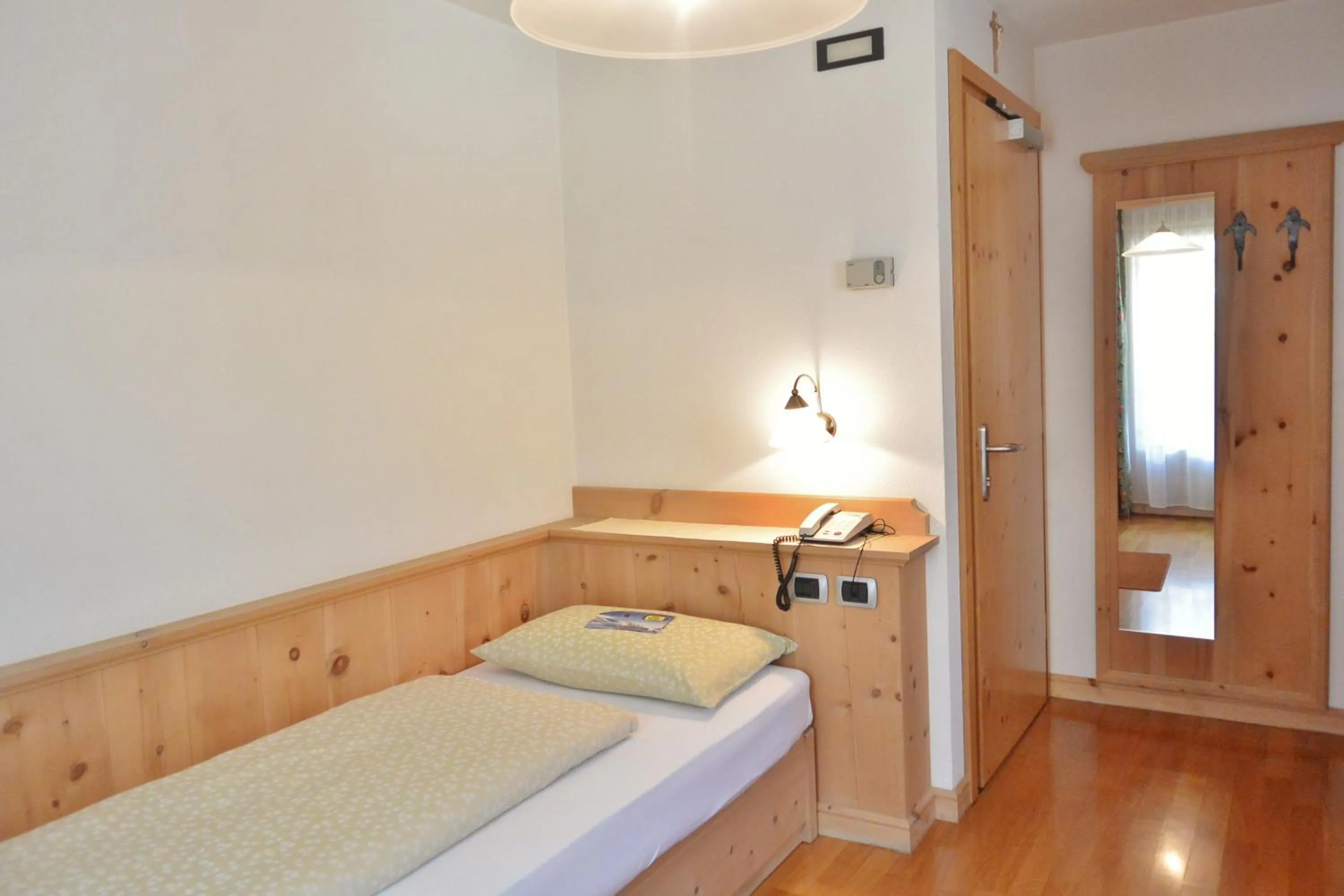 Bed in Hotel Garnì al Plan