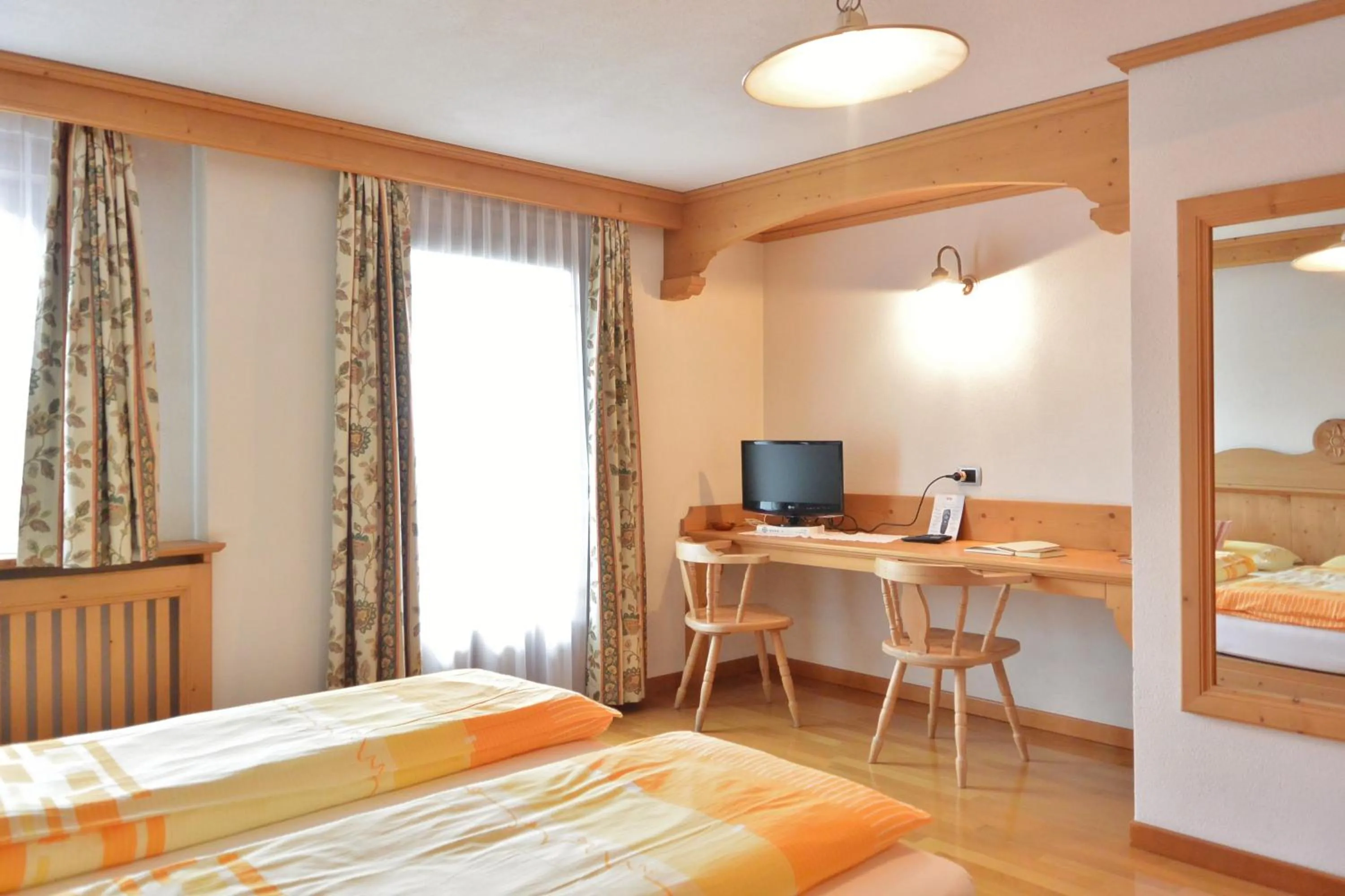 Bed in Hotel Garnì al Plan