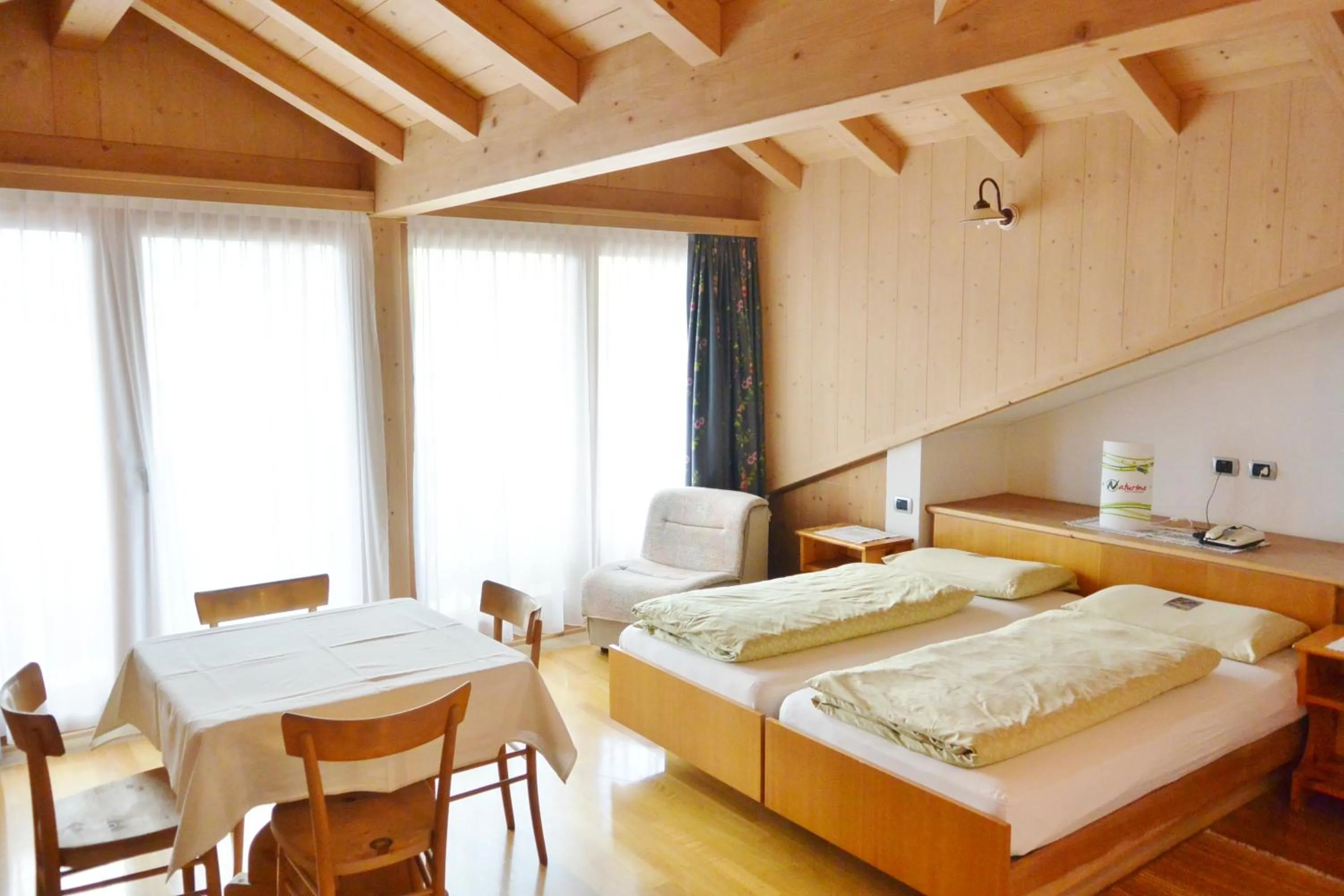 Bed in Hotel Garnì al Plan