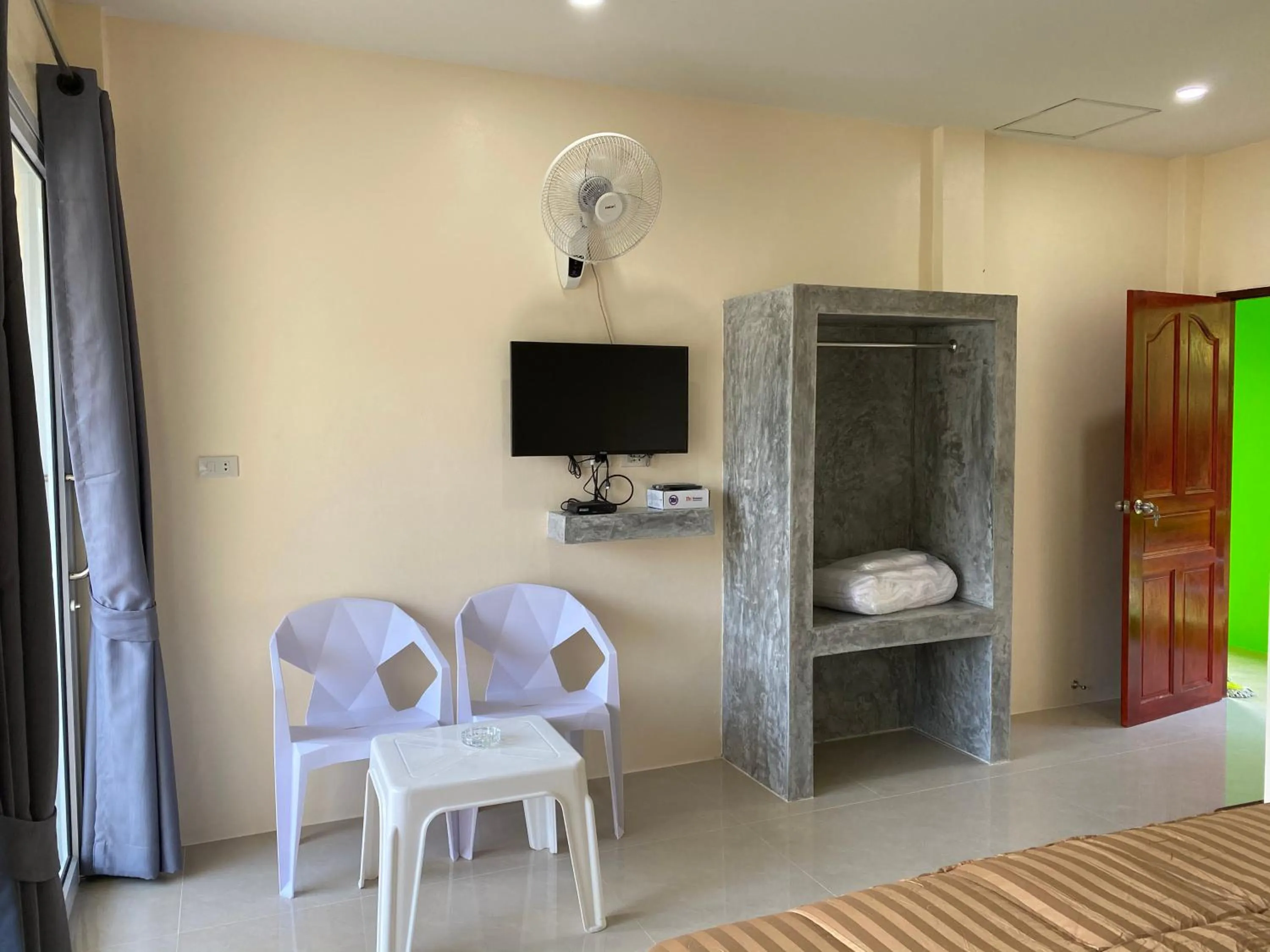 TV and multimedia in Budchui Guesthouse