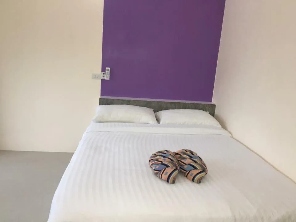 Bed in Budchui Guesthouse