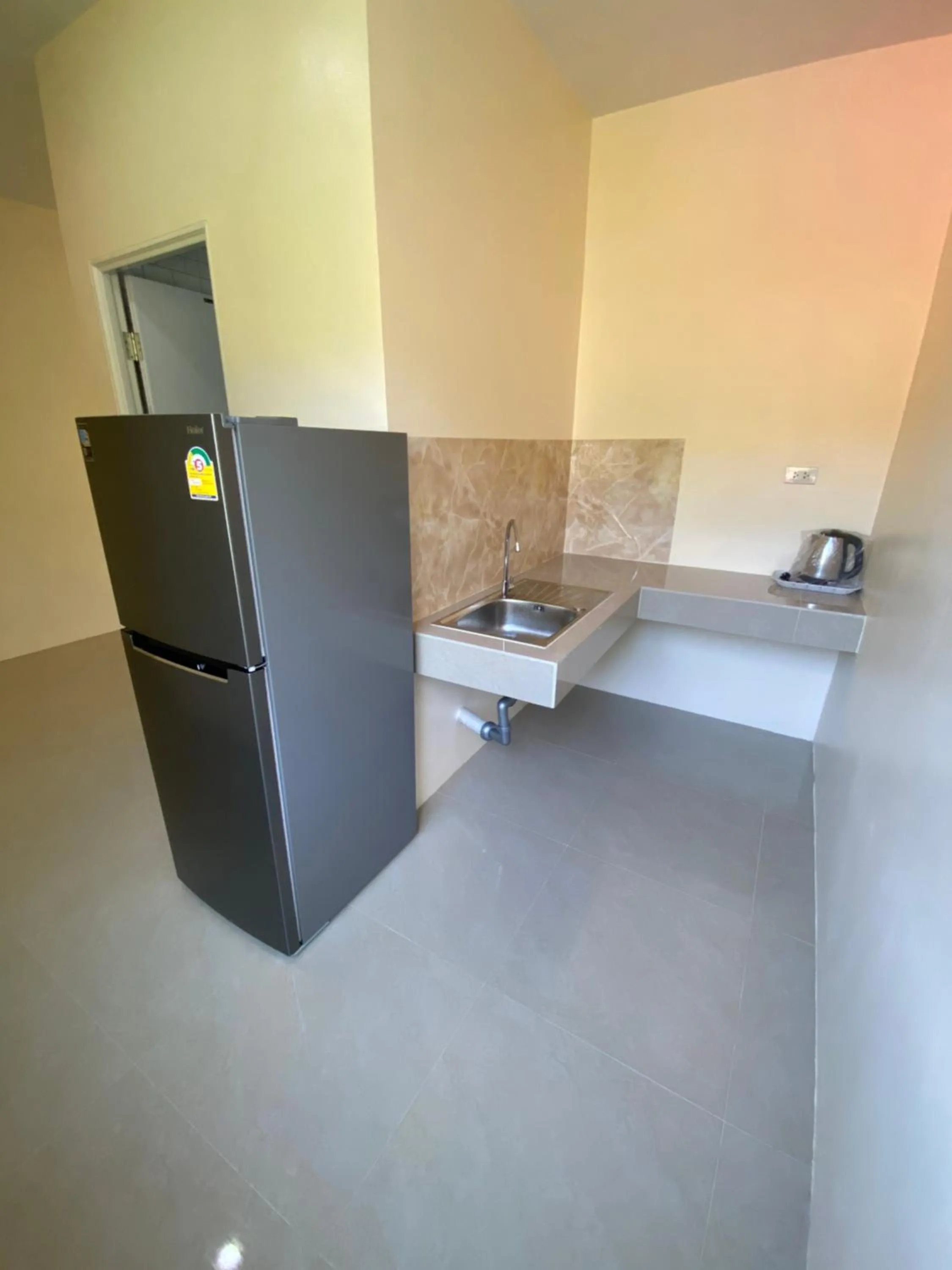 Communal kitchen in Budchui Guesthouse