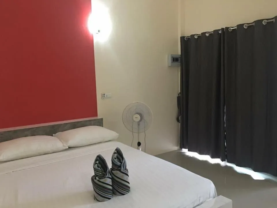 Bed in Budchui Guesthouse