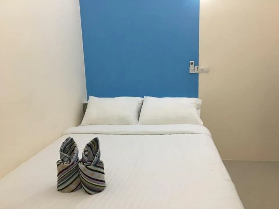 Bed in Budchui Guesthouse