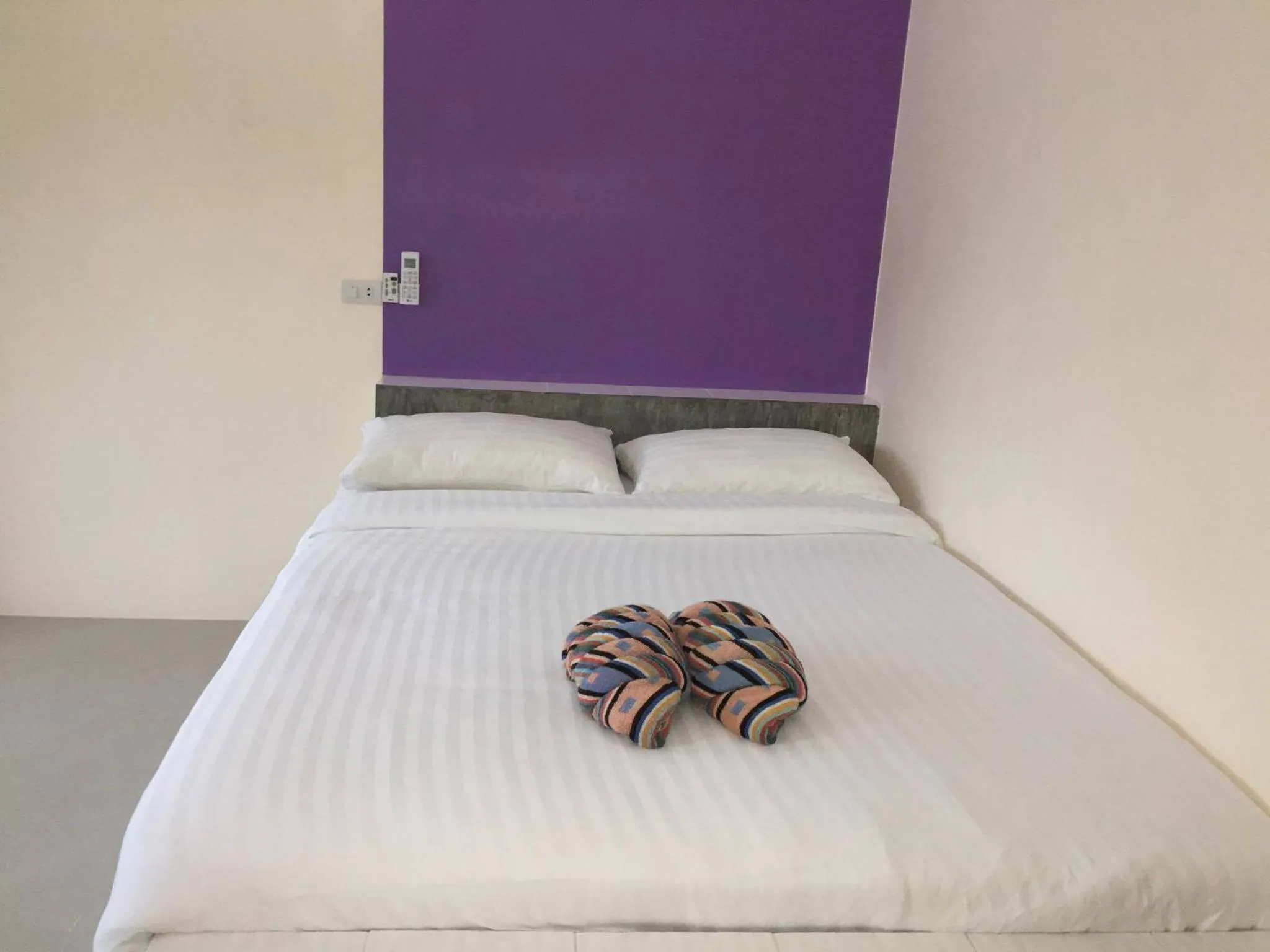 Bed in Budchui Guesthouse