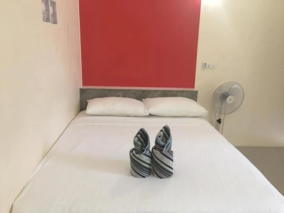 Bed in Budchui Guesthouse