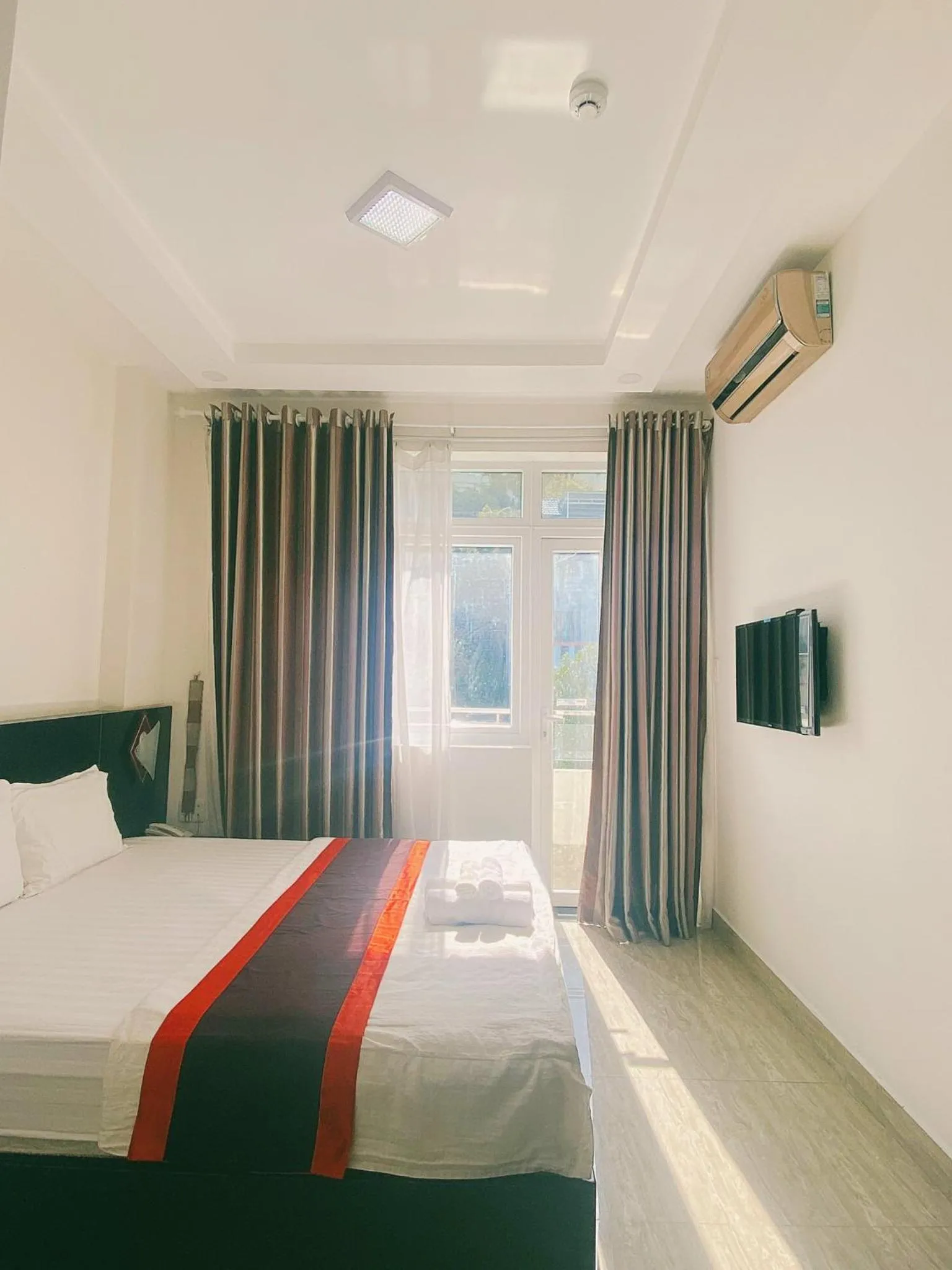 Bed in BH Residence Inn Hotel & Apartment