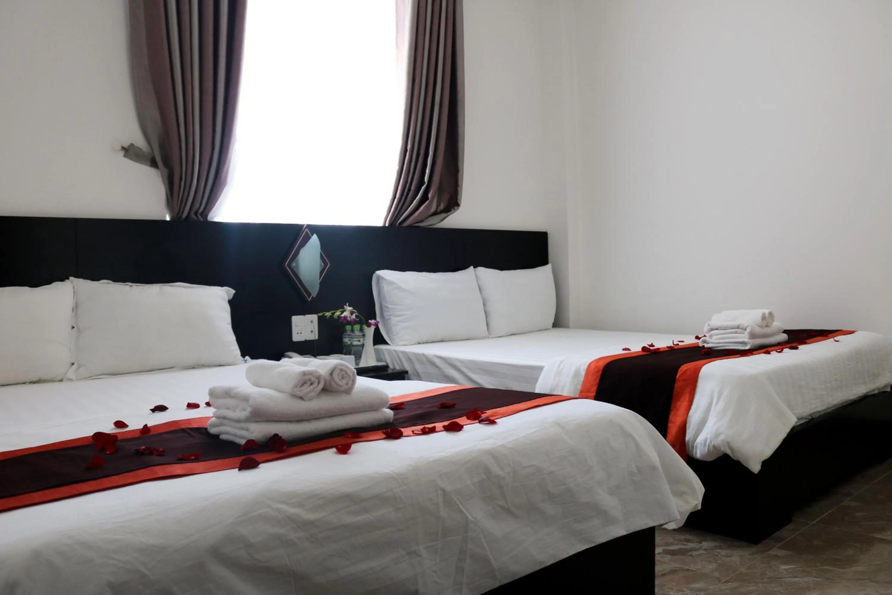Bed in BH Residence Inn Hotel & Apartment