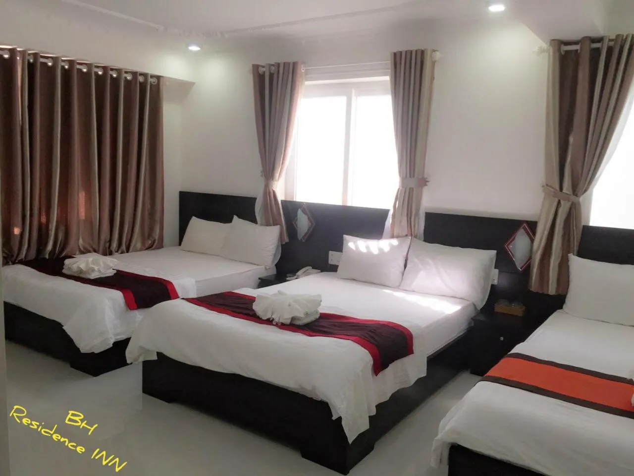 Bed in BH Residence Inn Hotel & Apartment