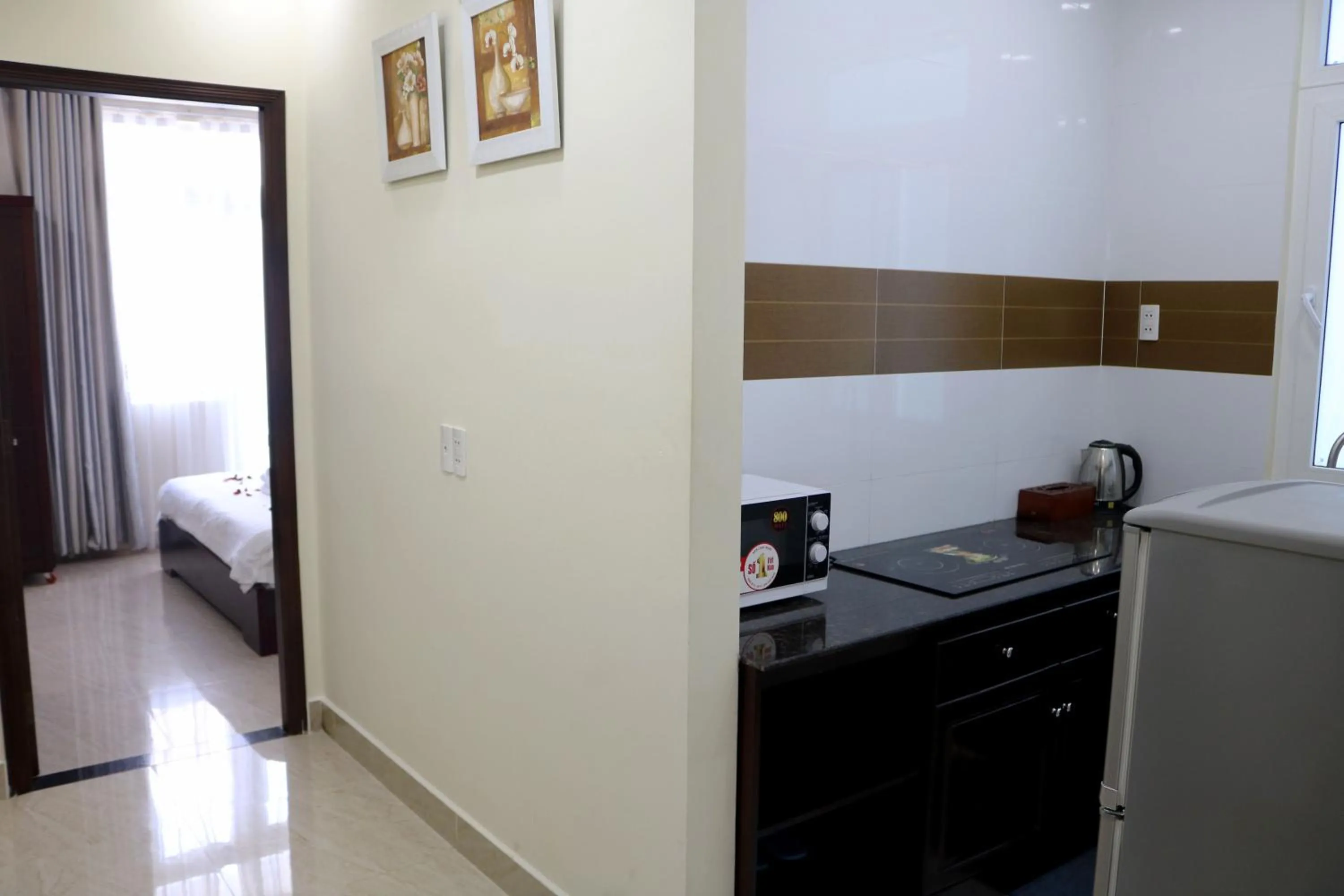 Kitchen or kitchenette in BH Residence Inn Hotel & Apartment