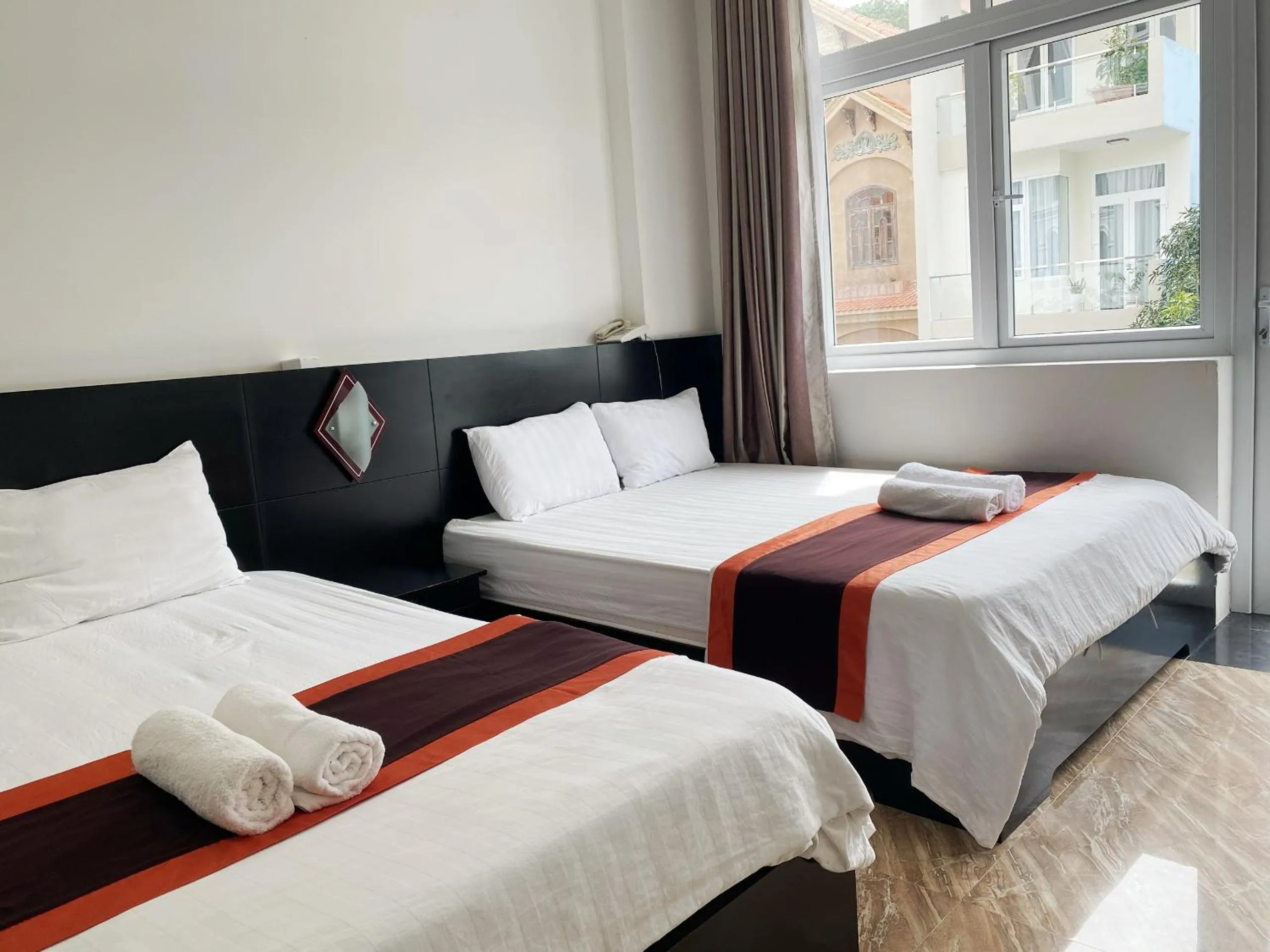 Bed in BH Residence Inn Hotel & Apartment
