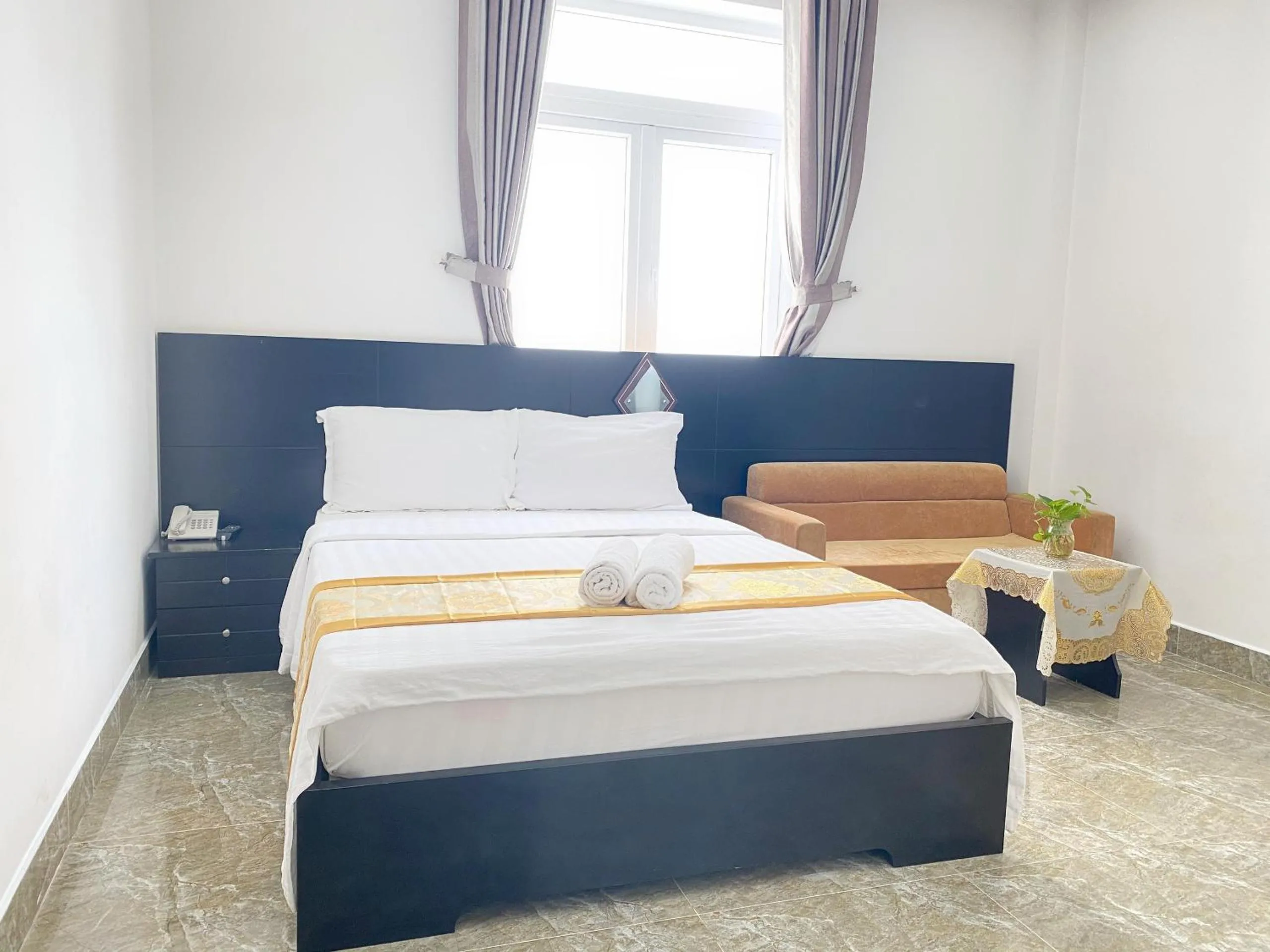 Bed in BH Residence Inn Hotel & Apartment