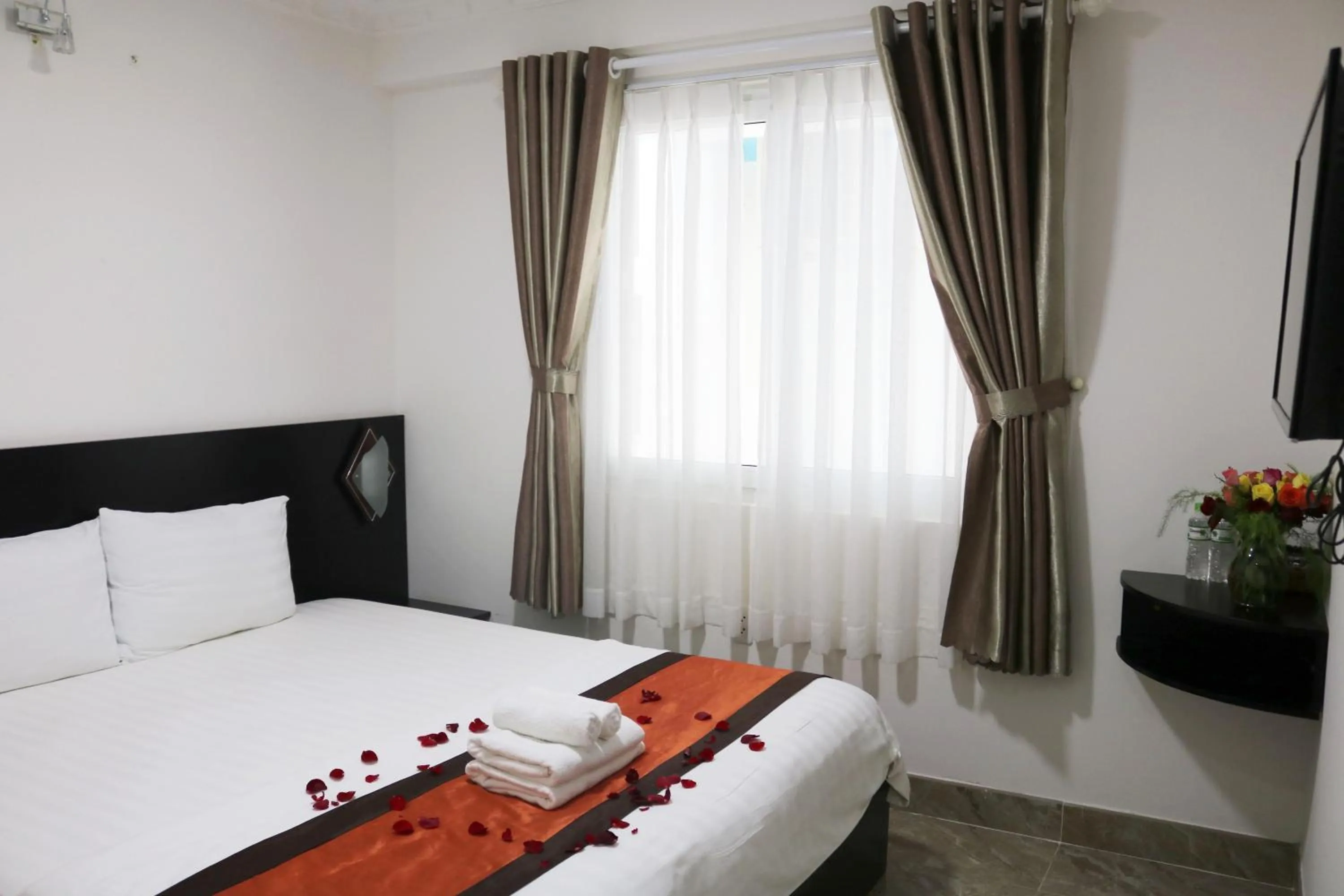 Bed in BH Residence Inn Hotel & Apartment