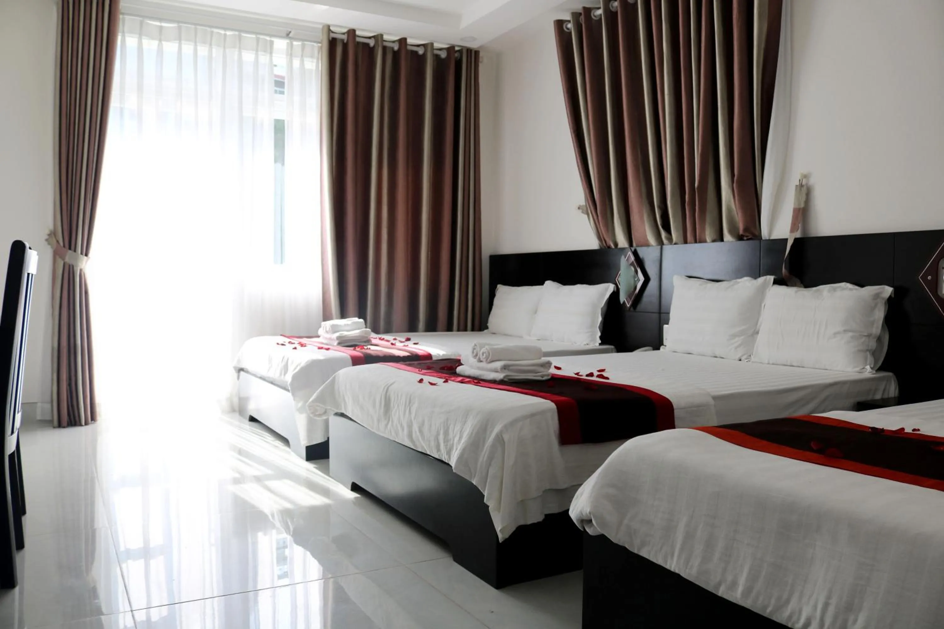 Bed in BH Residence Inn Hotel & Apartment