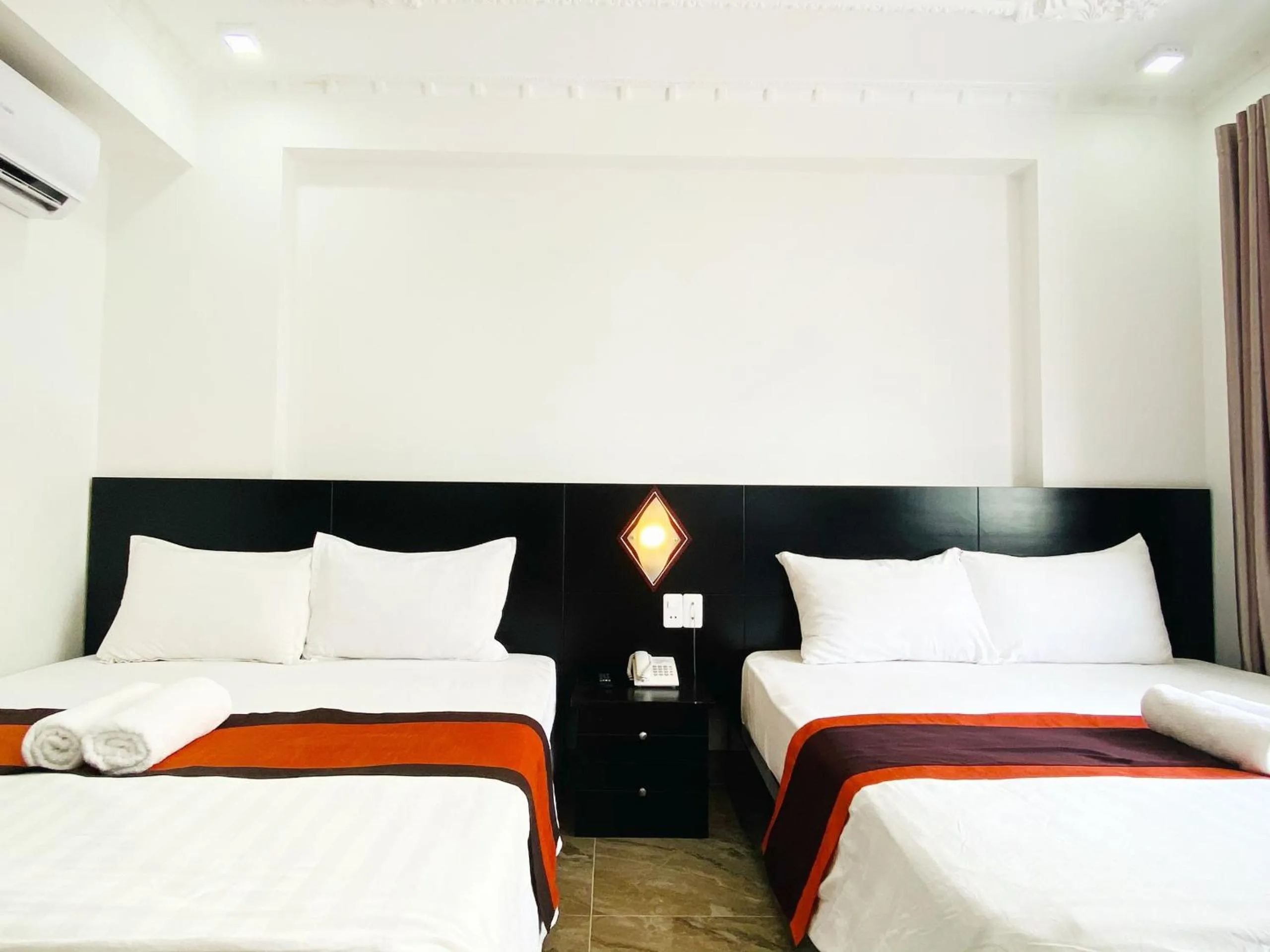 Bed in BH Residence Inn Hotel & Apartment