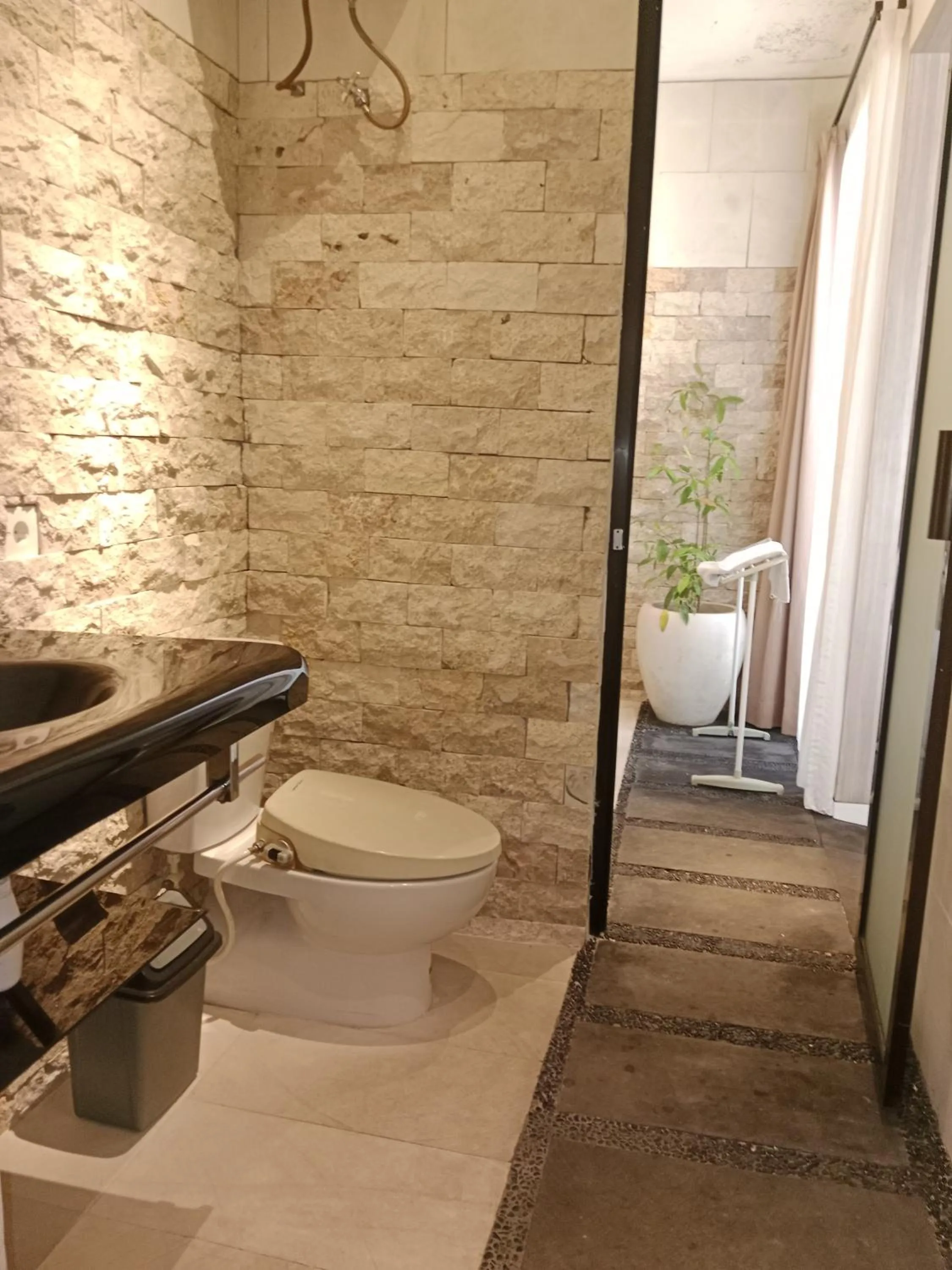 Toilet in Muaya Villa