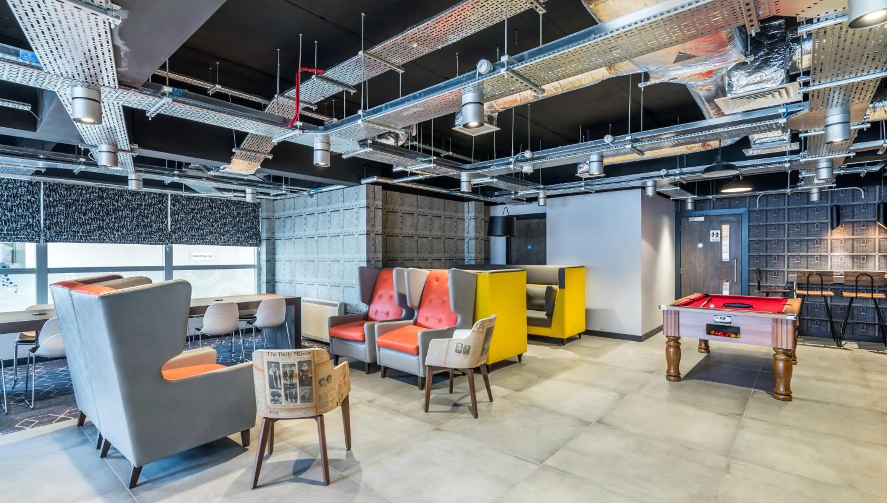 Communal lounge/ TV room in KM Hotel