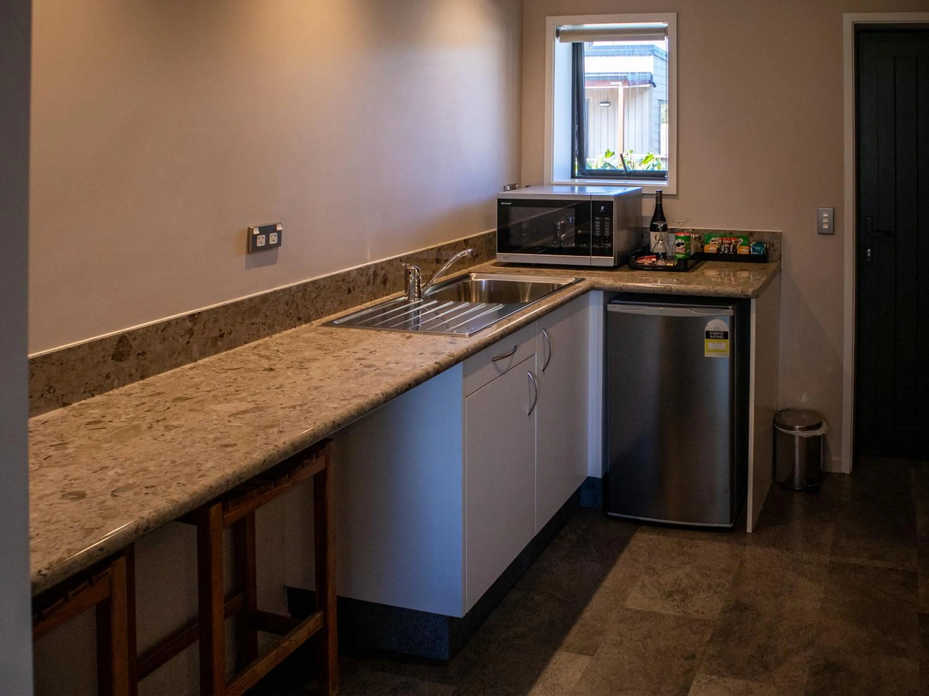 Kitchen or kitchenette in Paroa Hotel