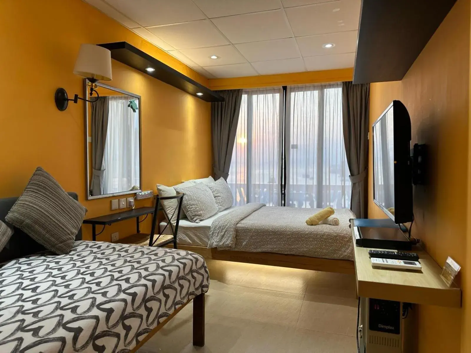 Harbor View Triple Room with Balcony and Kitchen in Bali Holiday Resort Harbor View Triple Room with Balcony and Kitchen in Bali Holiday Resort