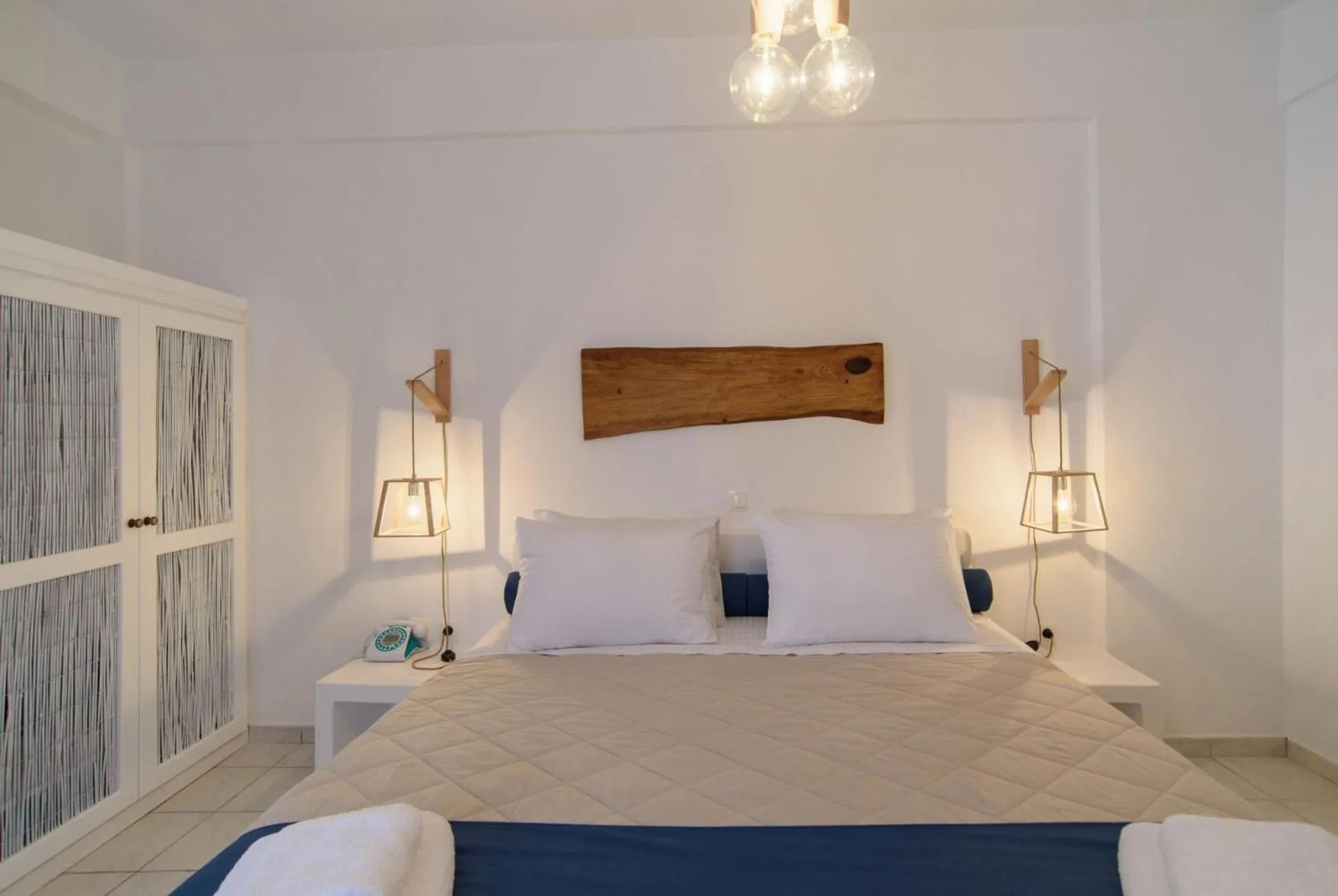 Decorative detail, Bed in Santorini Crystal Blue Boutique Hotel