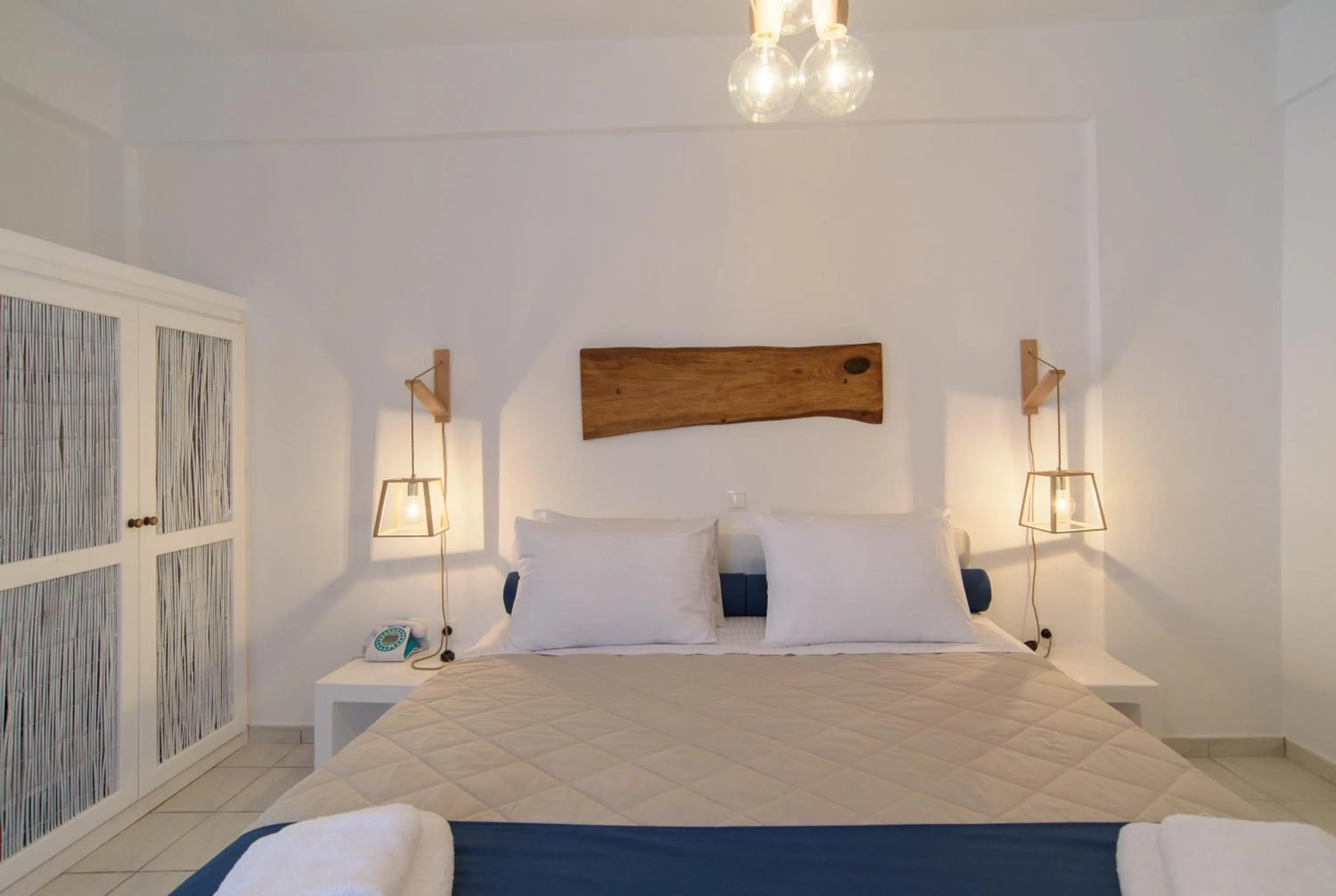 Decorative detail, Bed in Santorini Crystal Blue Boutique Hotel