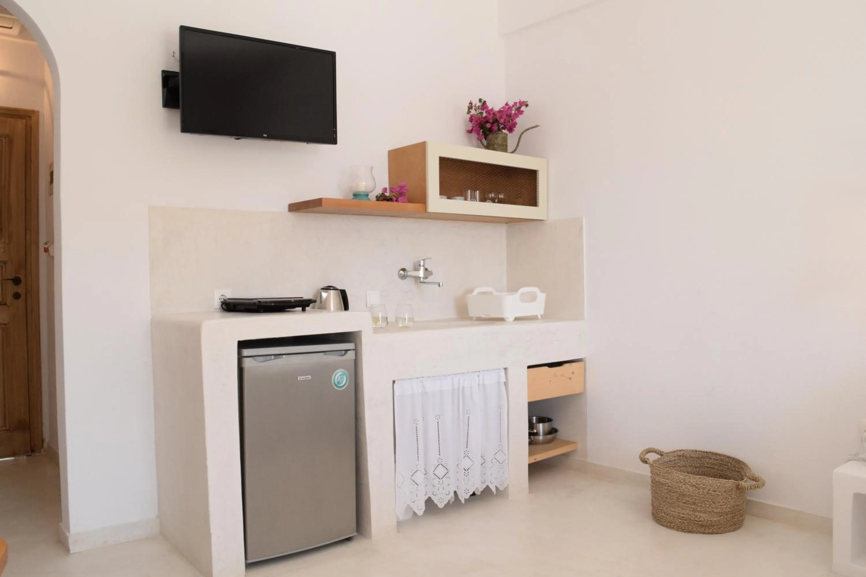 Kitchen or kitchenette in Santorini Crystal Blue Boutique Hotel