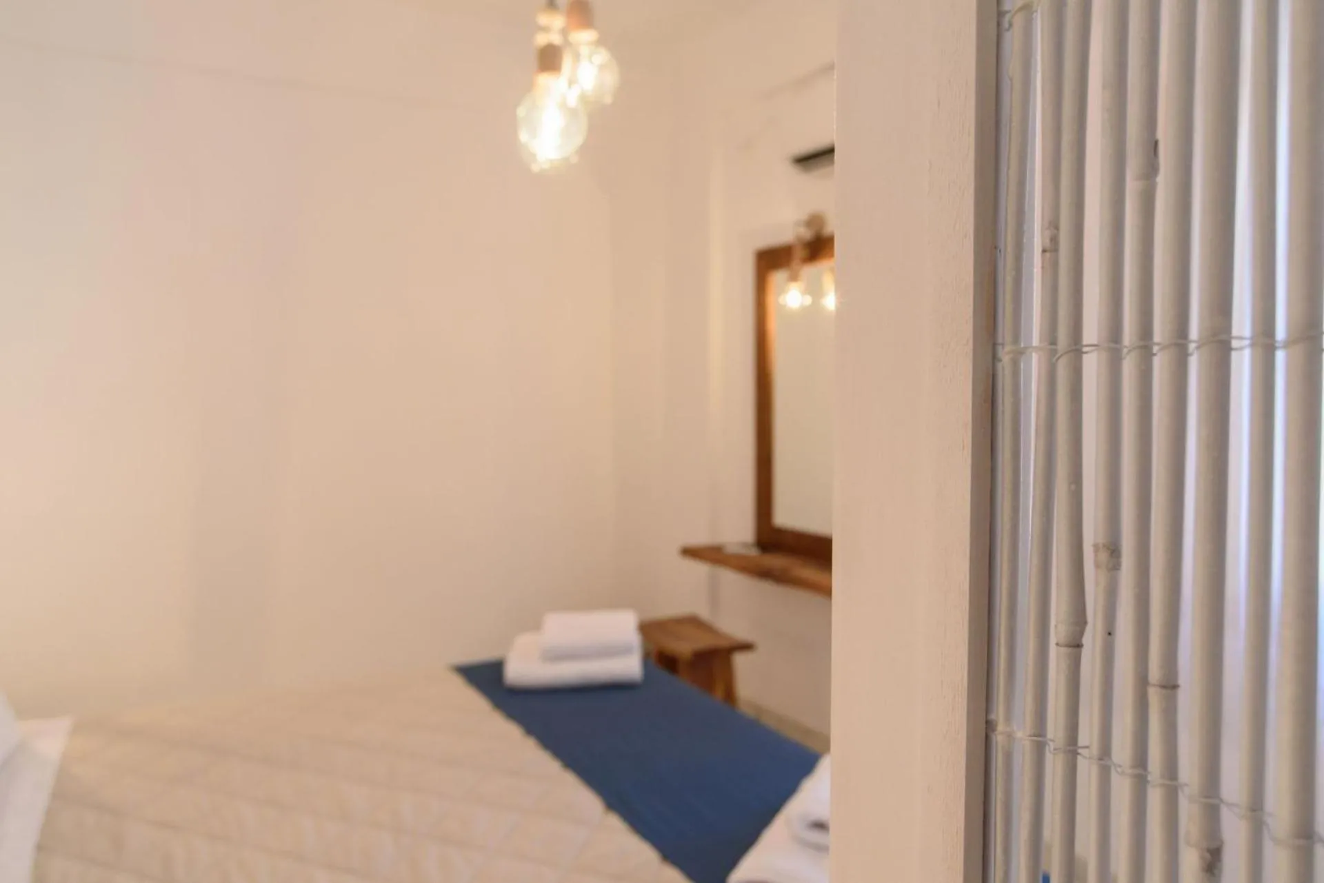 Photo of the whole room, Bed in Santorini Crystal Blue Boutique Hotel