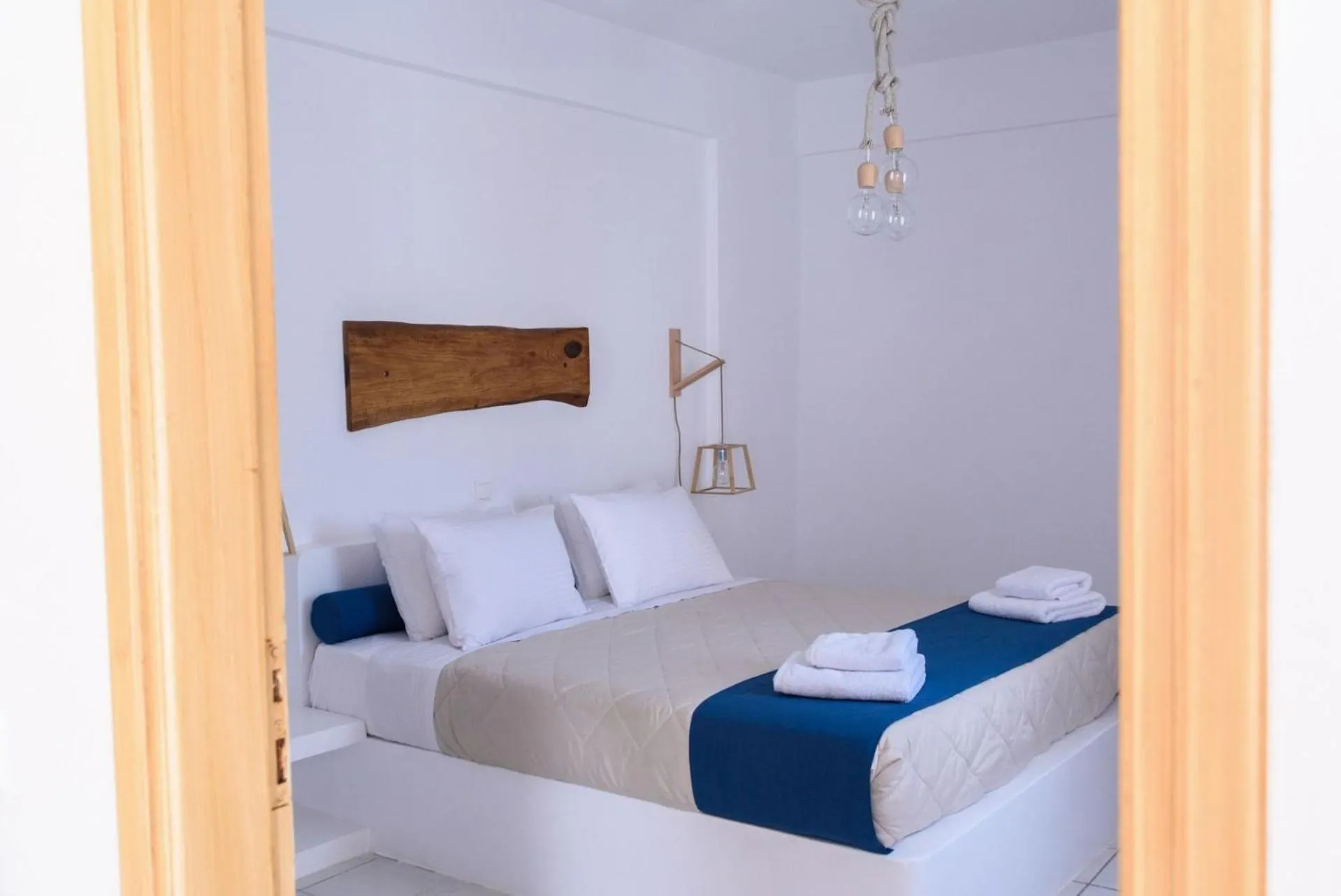 Decorative detail, Bed in Santorini Crystal Blue Boutique Hotel