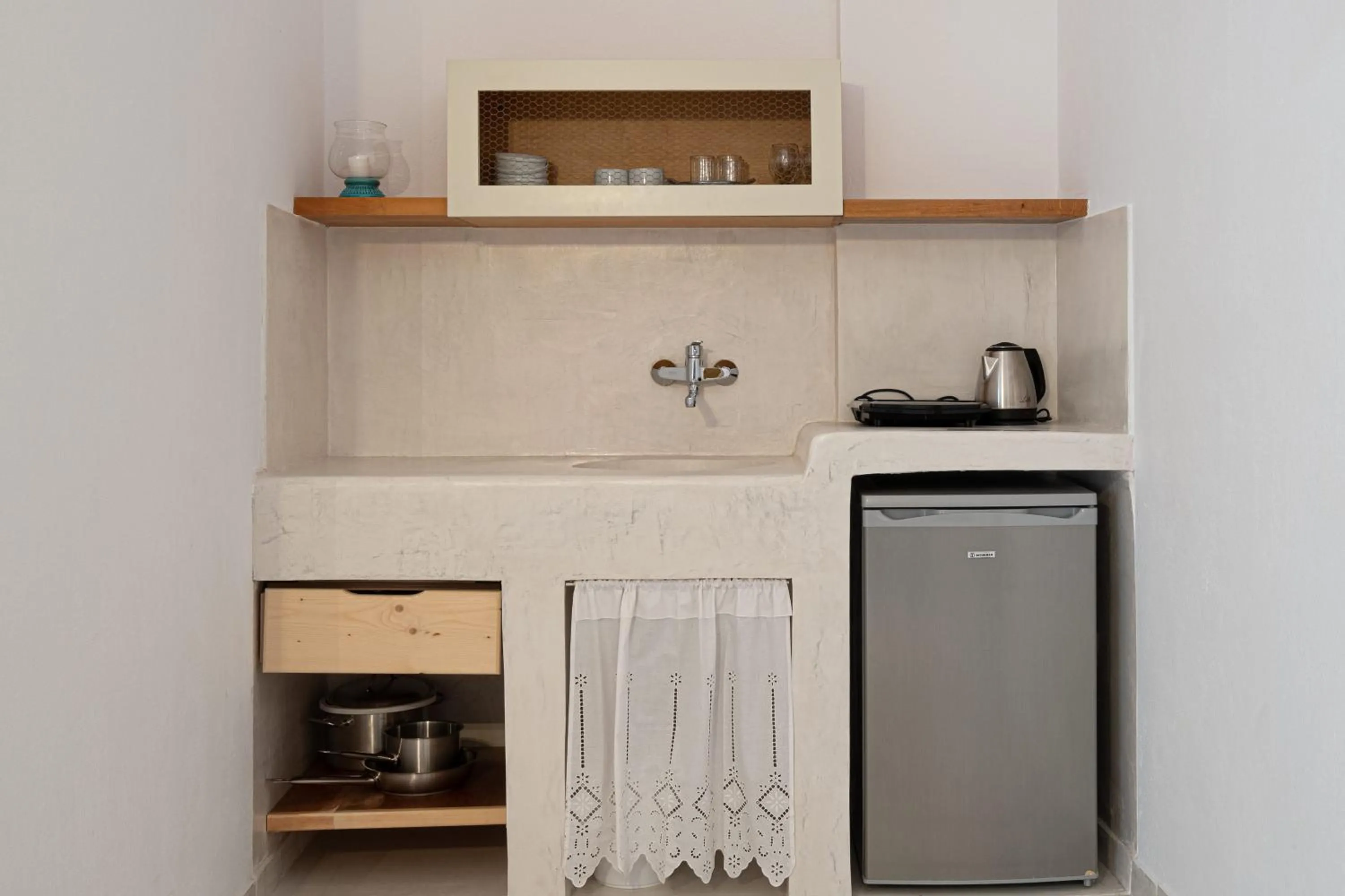 Kitchen or kitchenette in Santorini Crystal Blue Boutique Hotel