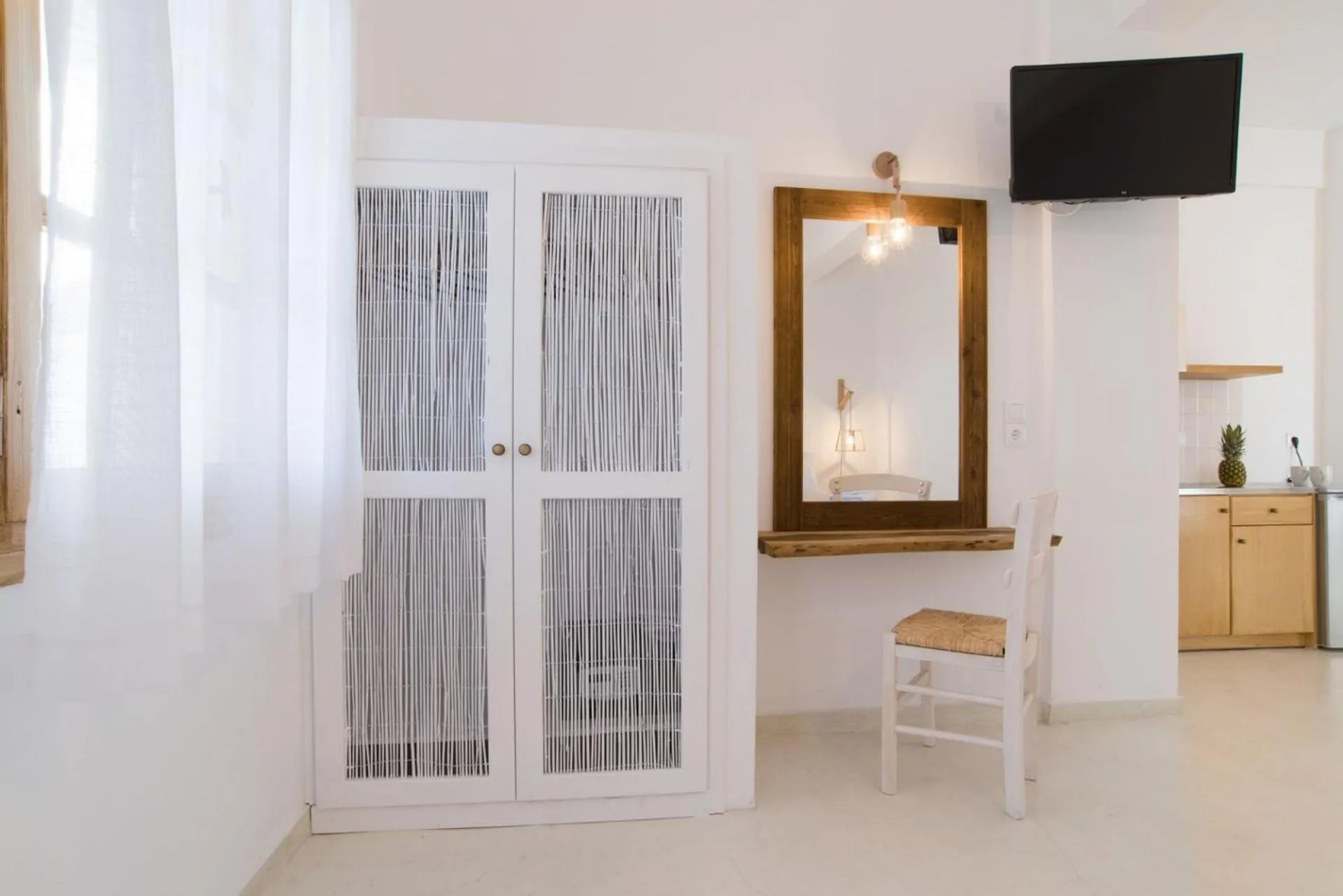 TV and multimedia in Santorini Crystal Blue Boutique Hotel