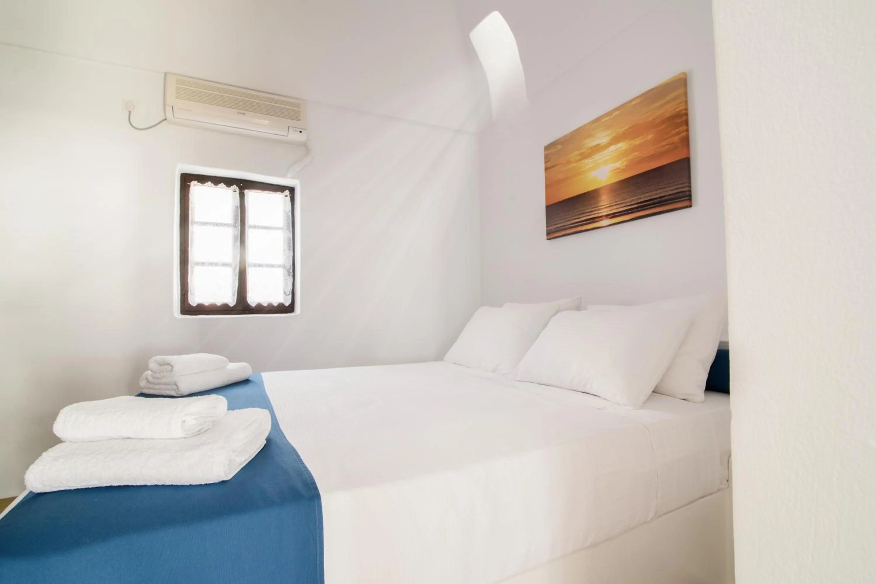 Photo of the whole room, Bed in Santorini Crystal Blue Boutique Hotel