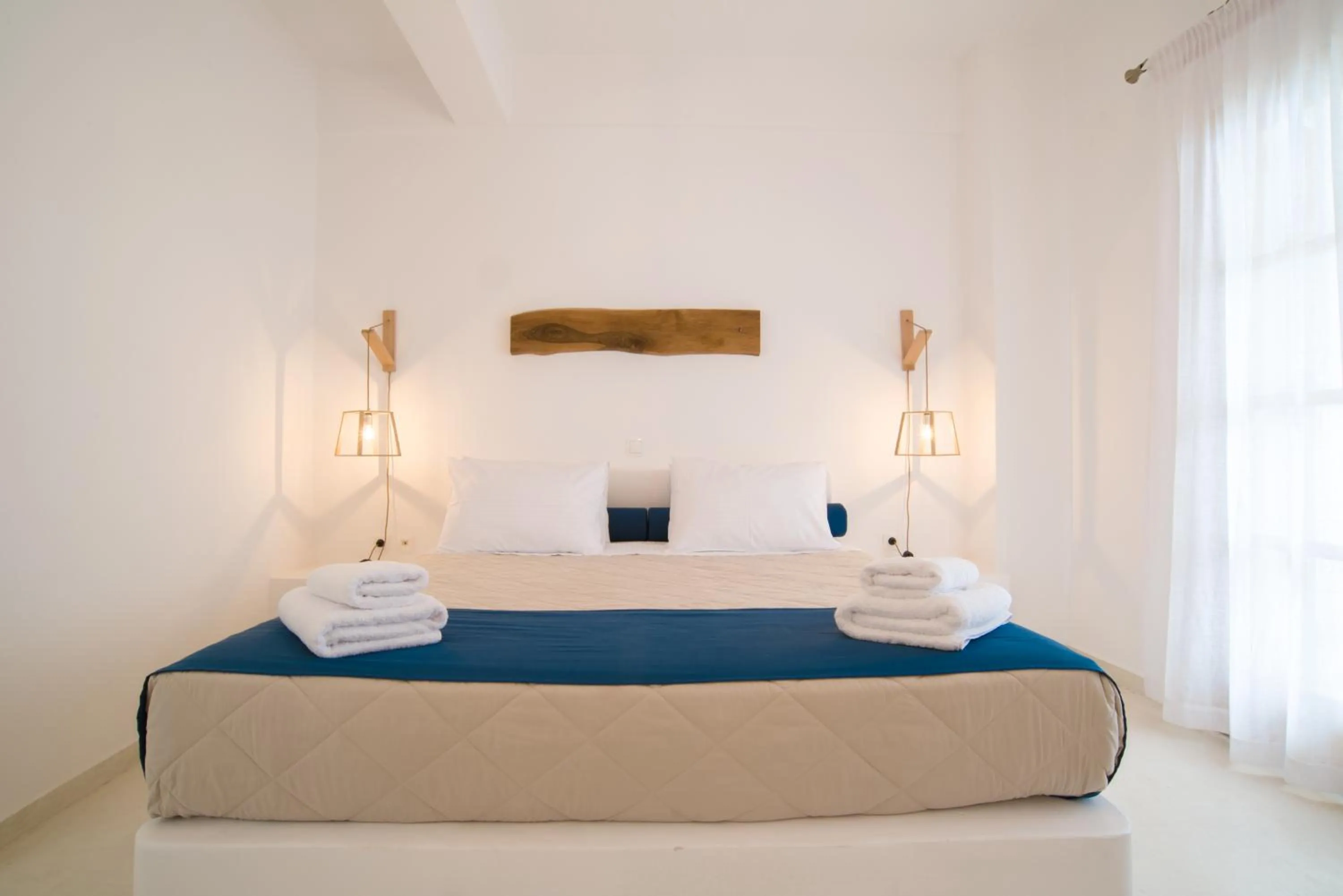 Bed in Santorini Crystal Blue Boutique Hotel