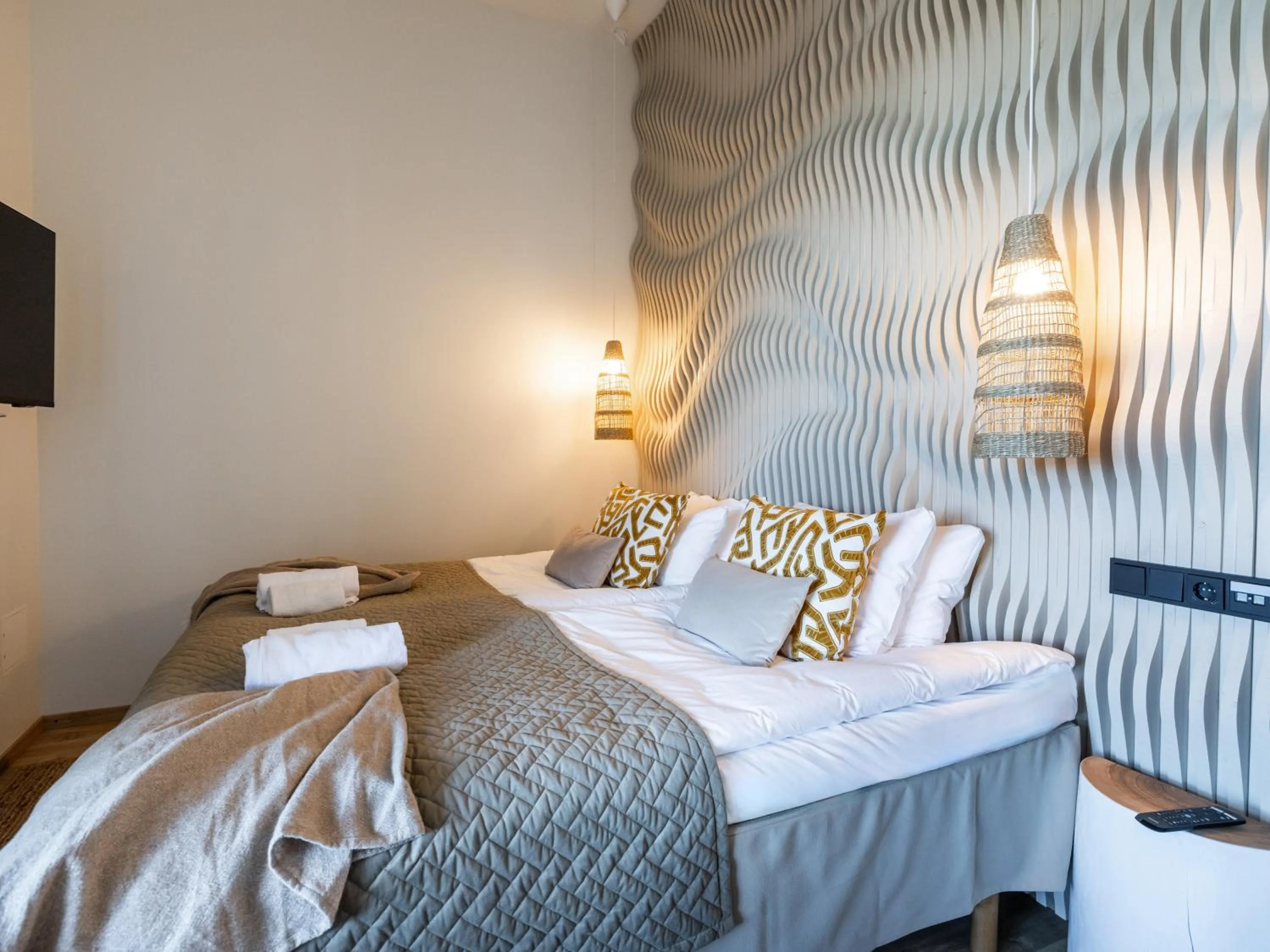 Bed in Santa's Resort & Spa Hotel Sani