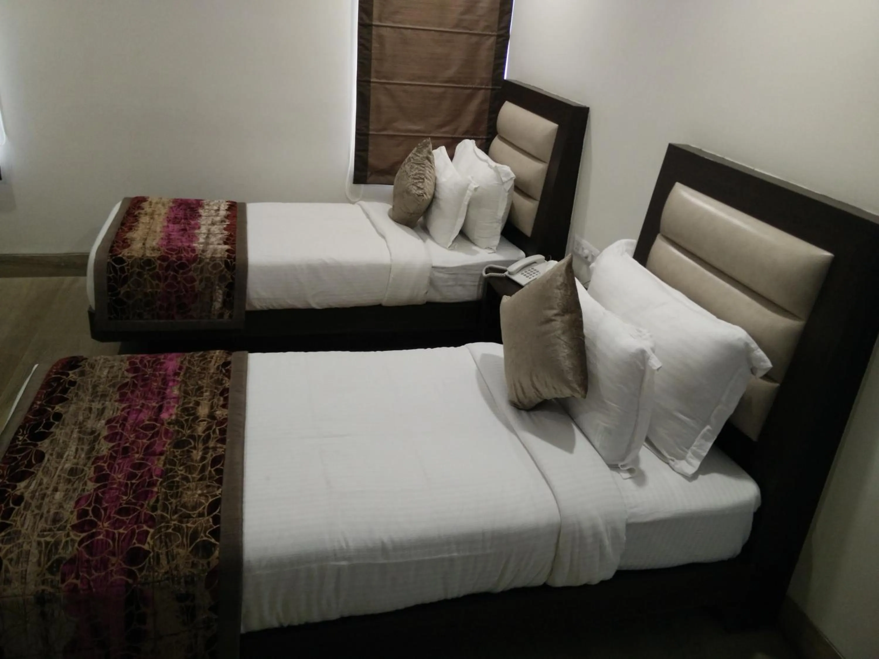 Bed in Hotel Central Palace