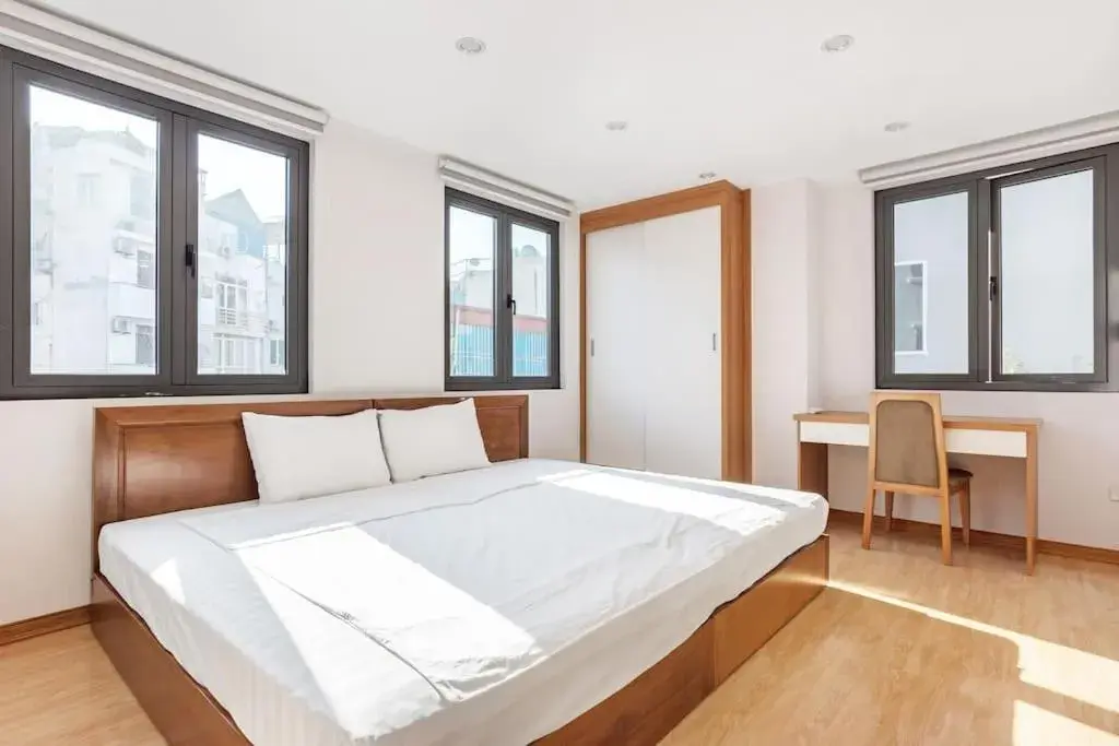 Seating area, Bed in An Nguyen Building Seating area, Bed in An Nguyen Building