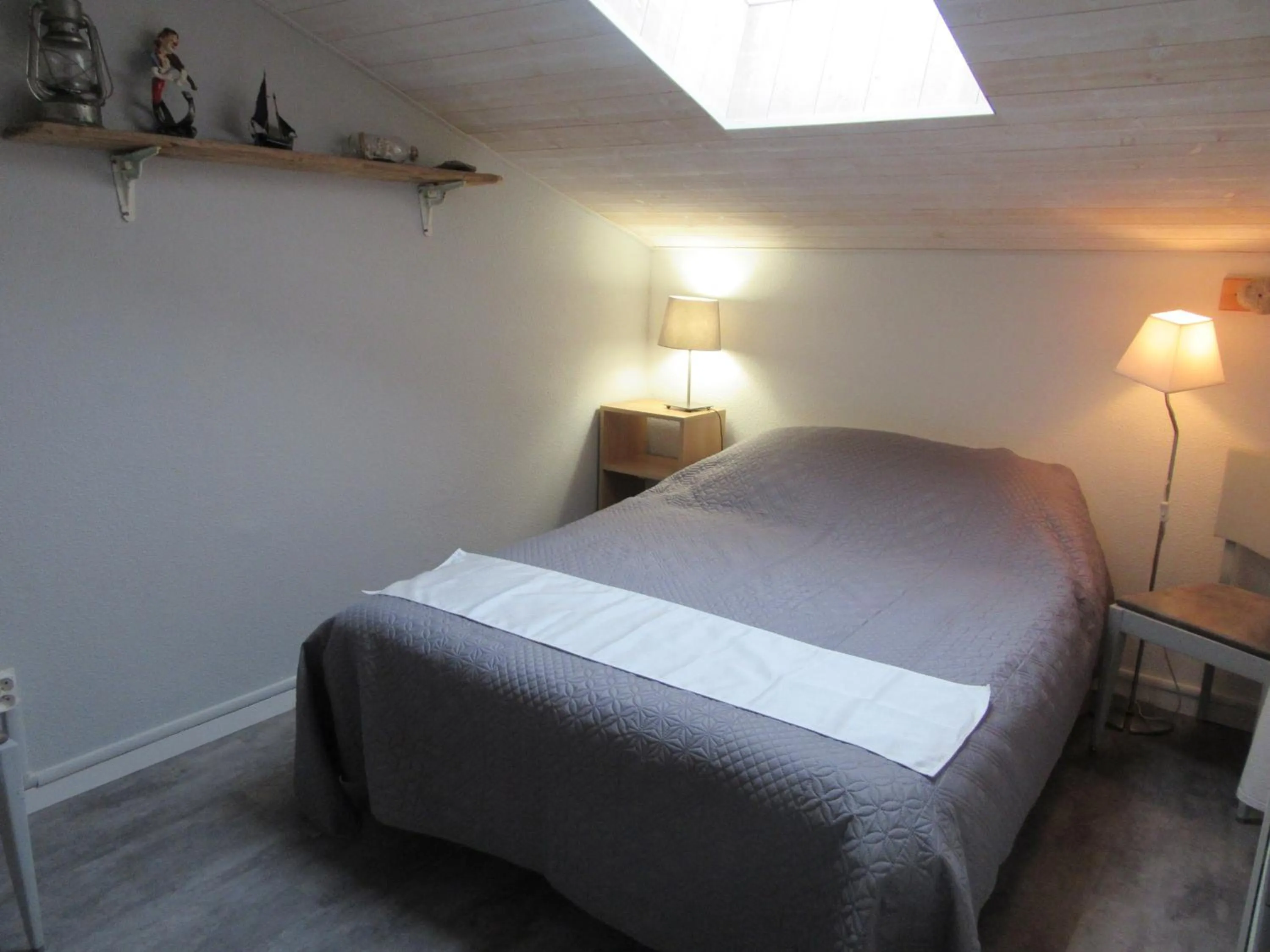 Bed in Appartement Grand Calypso