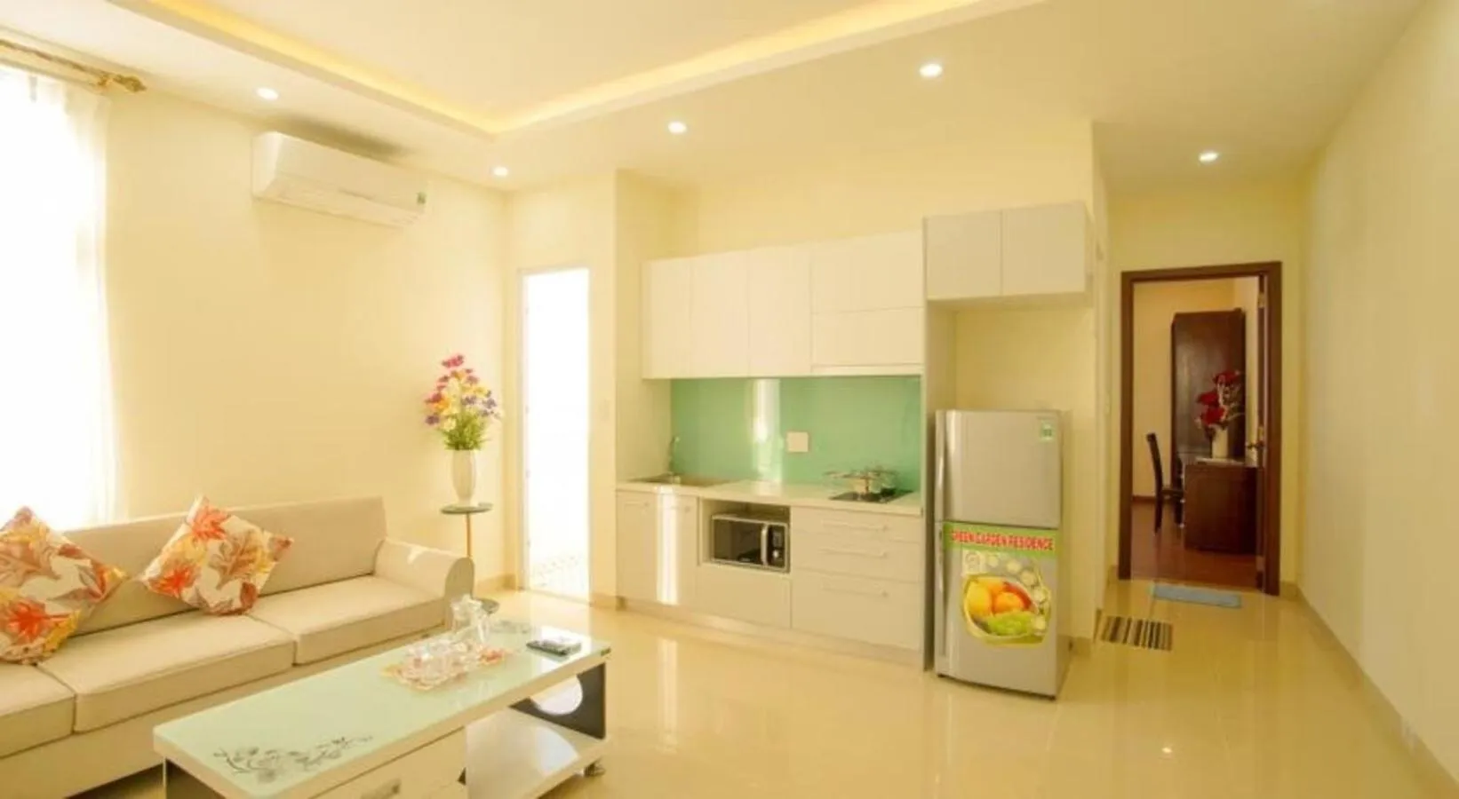 Kitchen or kitchenette in Green Garden Residence Hotel