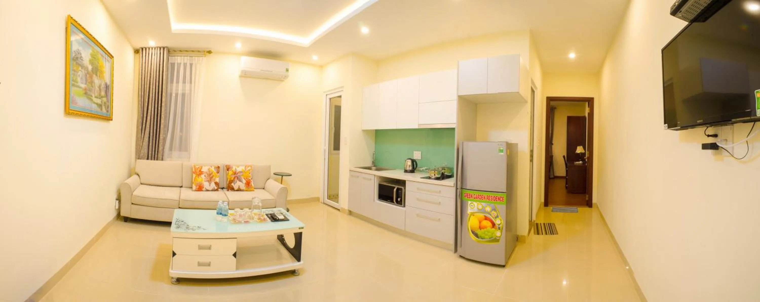 Kitchen or kitchenette in Green Garden Residence Hotel