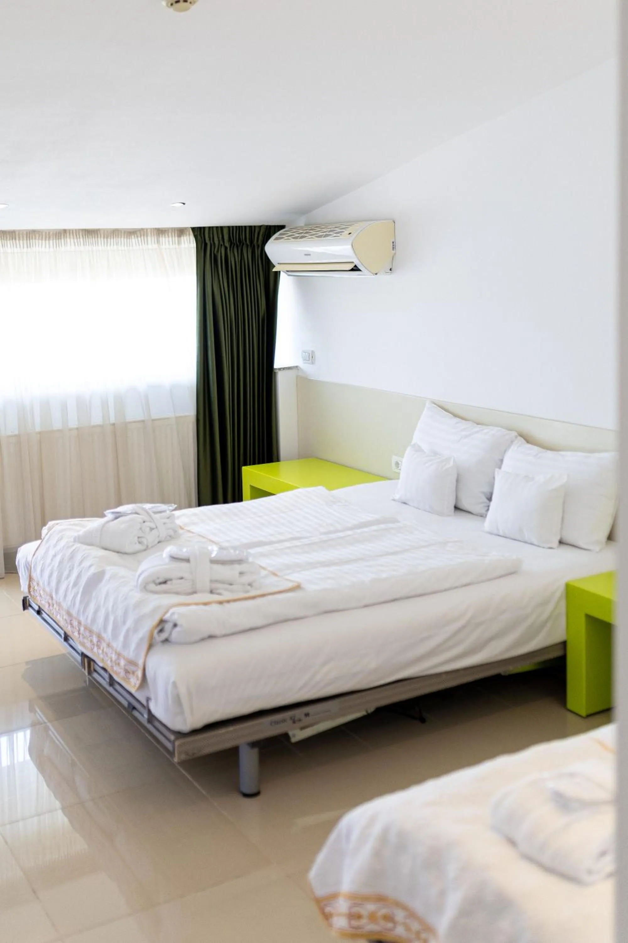 Bed in Christina Hotel