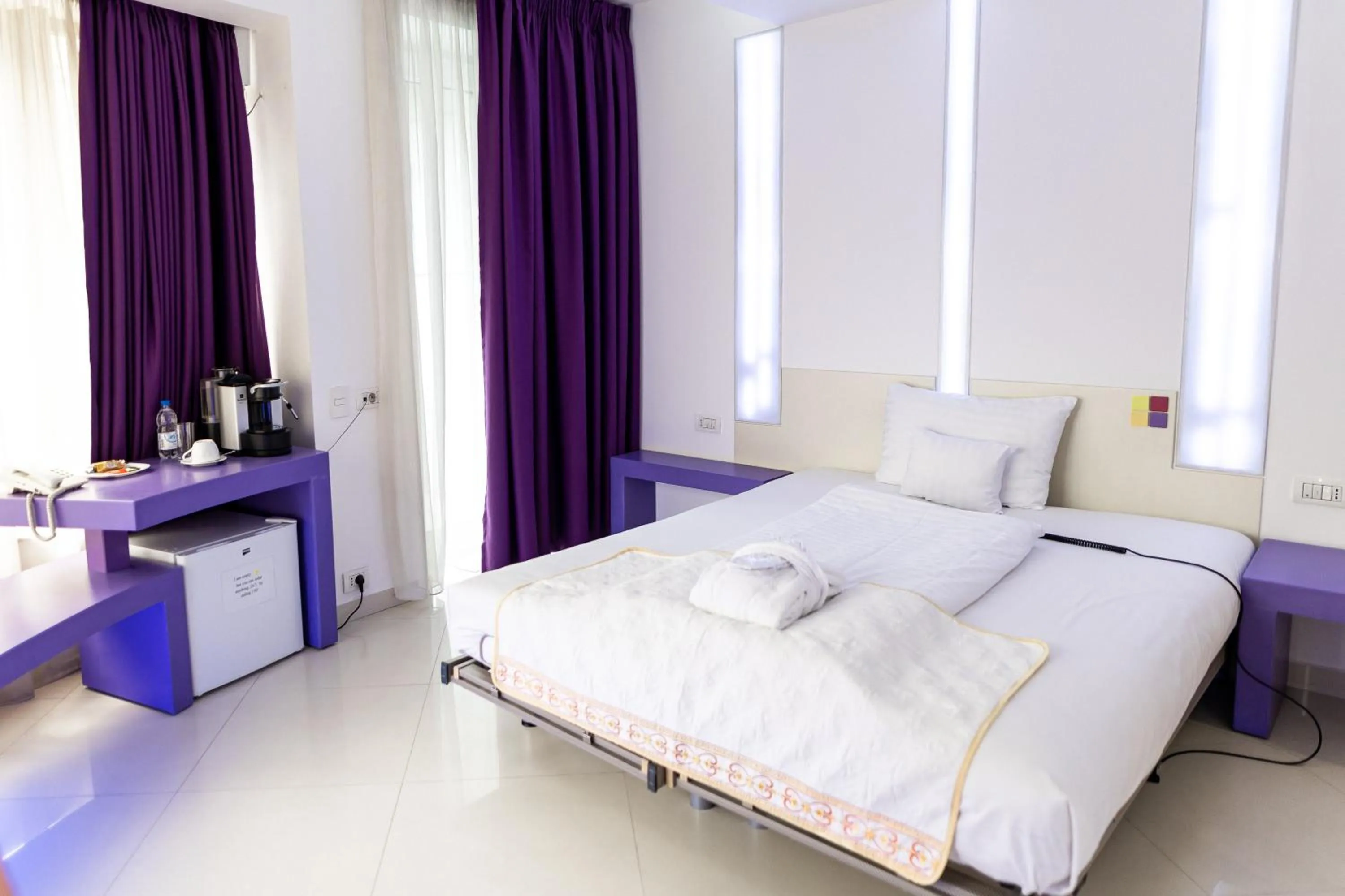 Bed in Christina Hotel