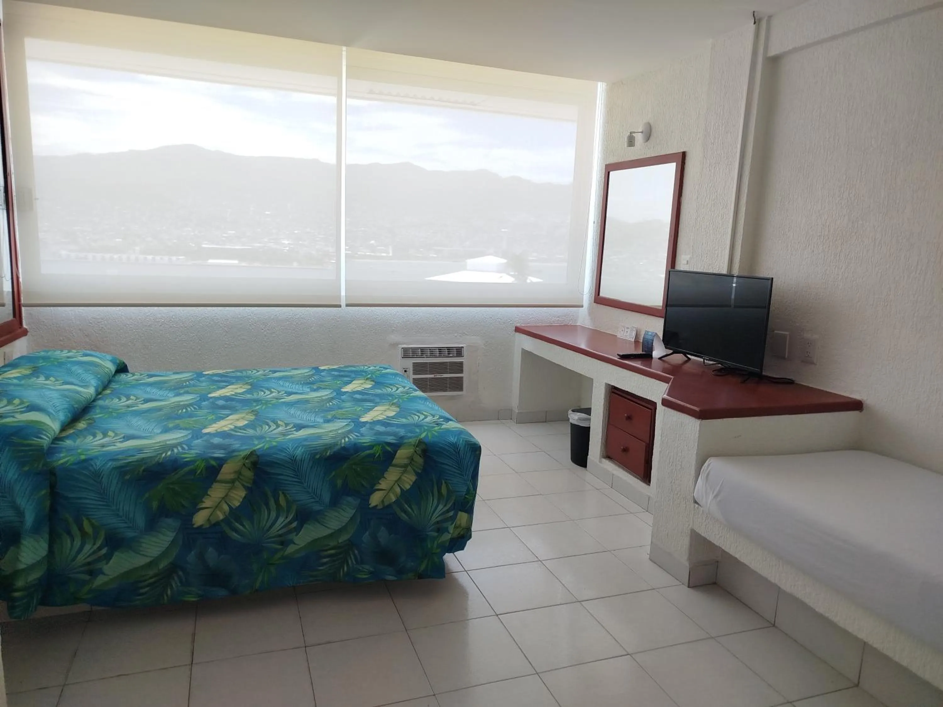 Bed in Hotel Aristos Acapulco