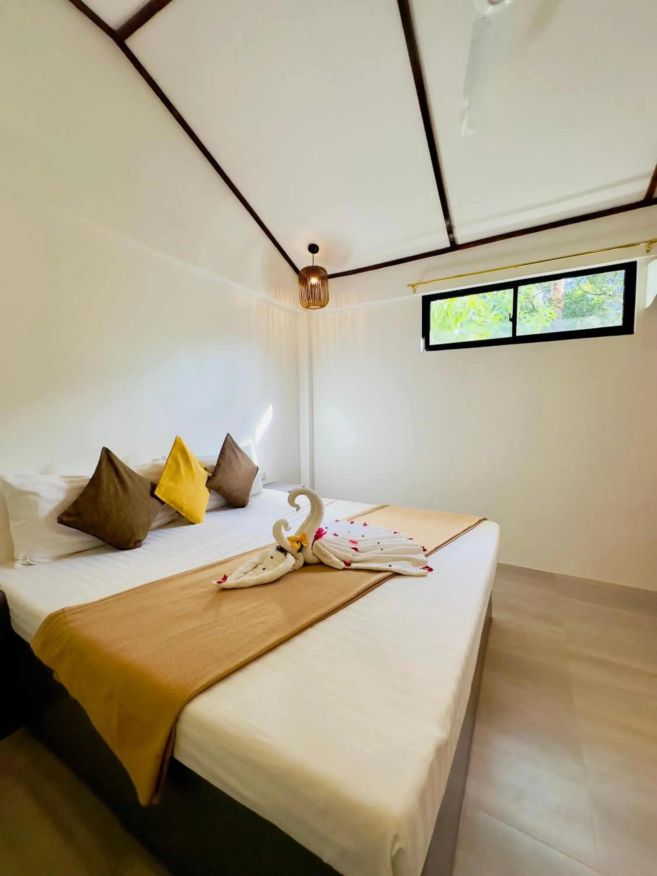 Bed in El Nido Coco Resort Bed in El Nido Coco Resort