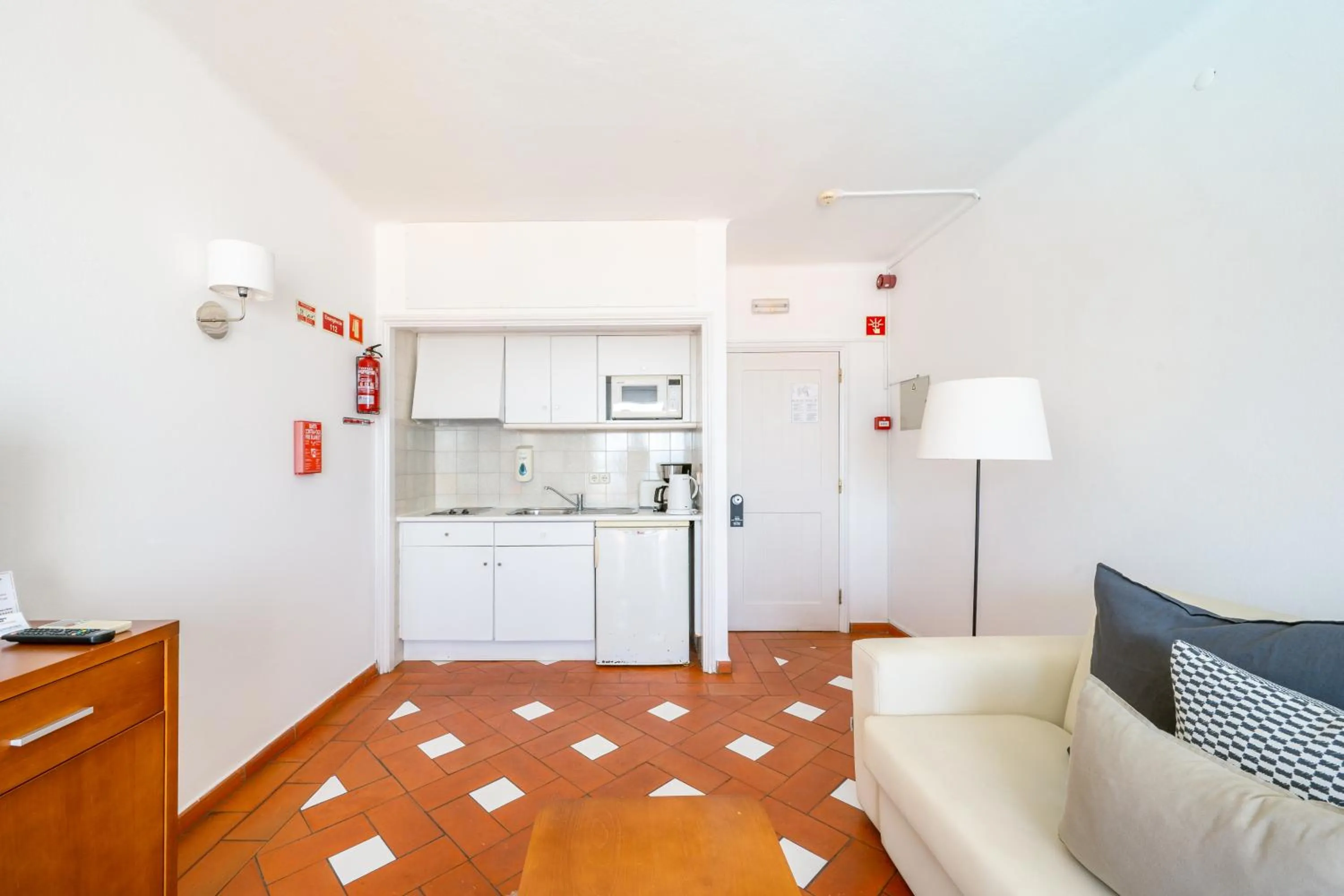Kitchen or kitchenette in Baluarte da Vila Apartments