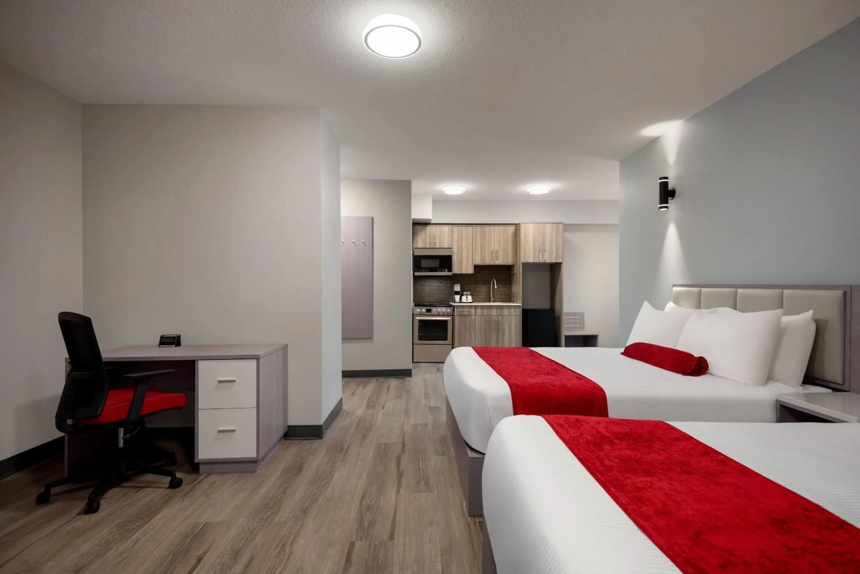Photo of the whole room, Bed in Ramada by Wyndham West Edmonton Hotel & Suites