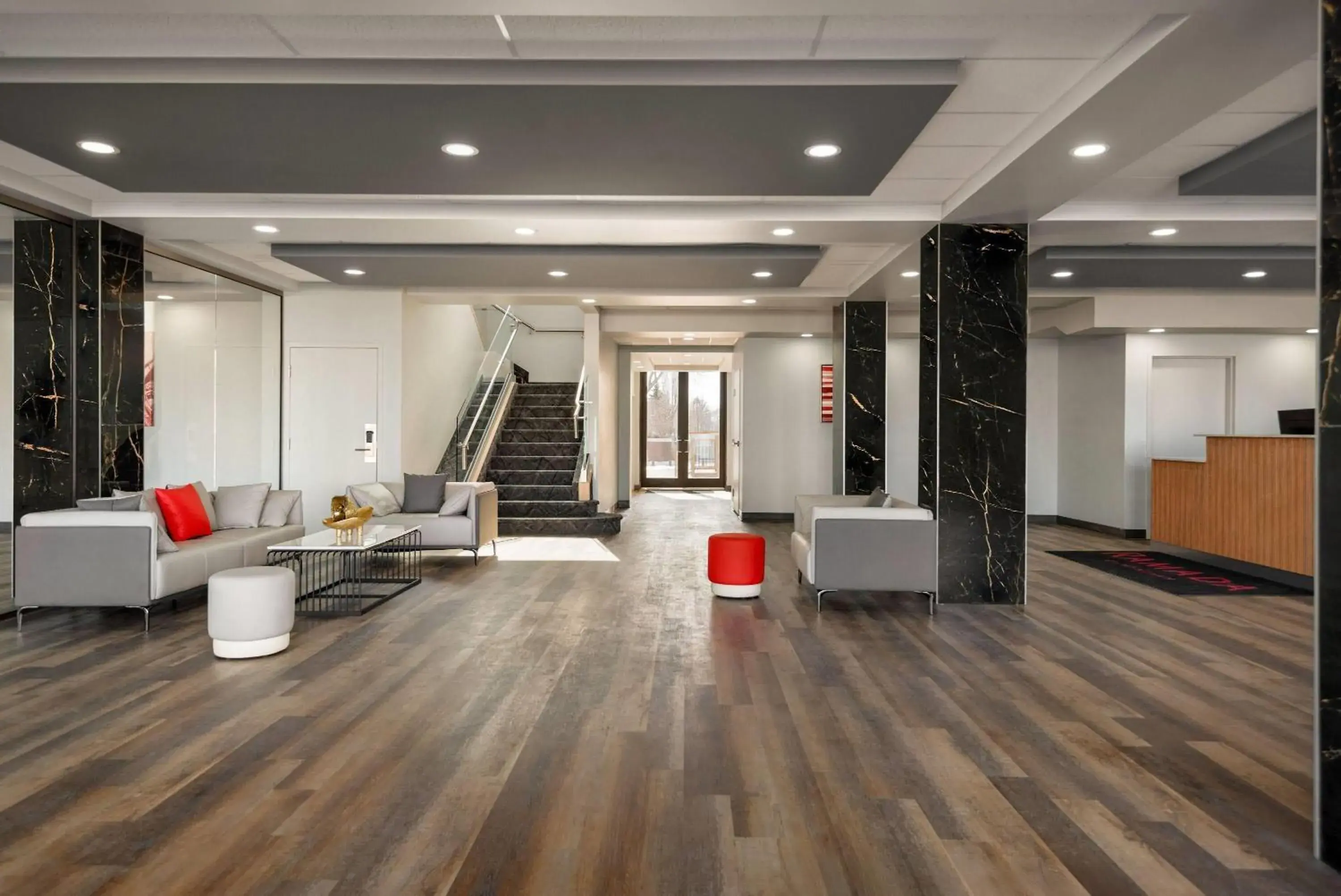 Lobby or reception in Ramada by Wyndham West Edmonton Hotel & Suites Lobby or reception in Ramada by Wyndham West Edmonton Hotel & Suites