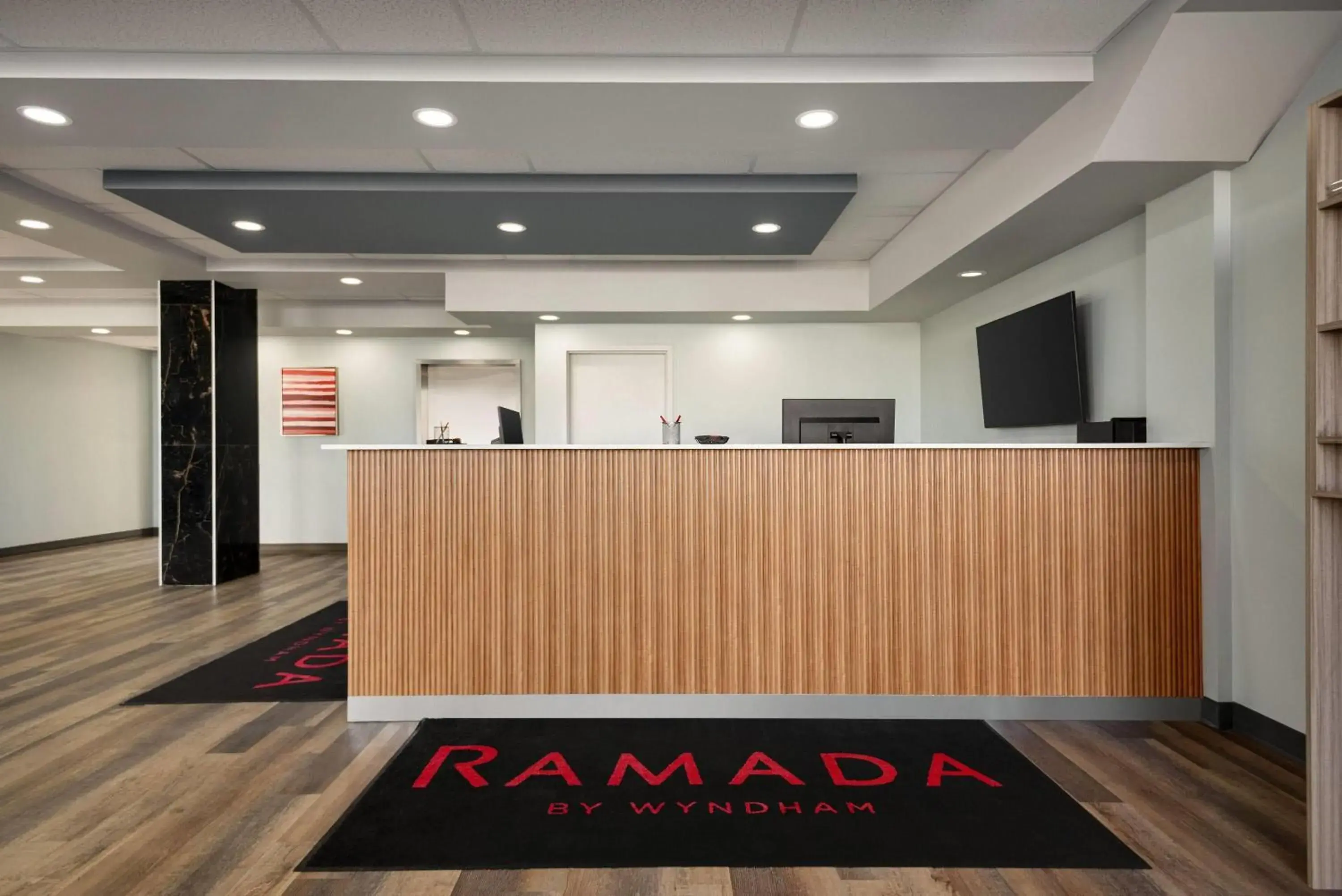 Lobby or reception in Ramada by Wyndham West Edmonton Hotel & Suites Lobby or reception in Ramada by Wyndham West Edmonton Hotel & Suites