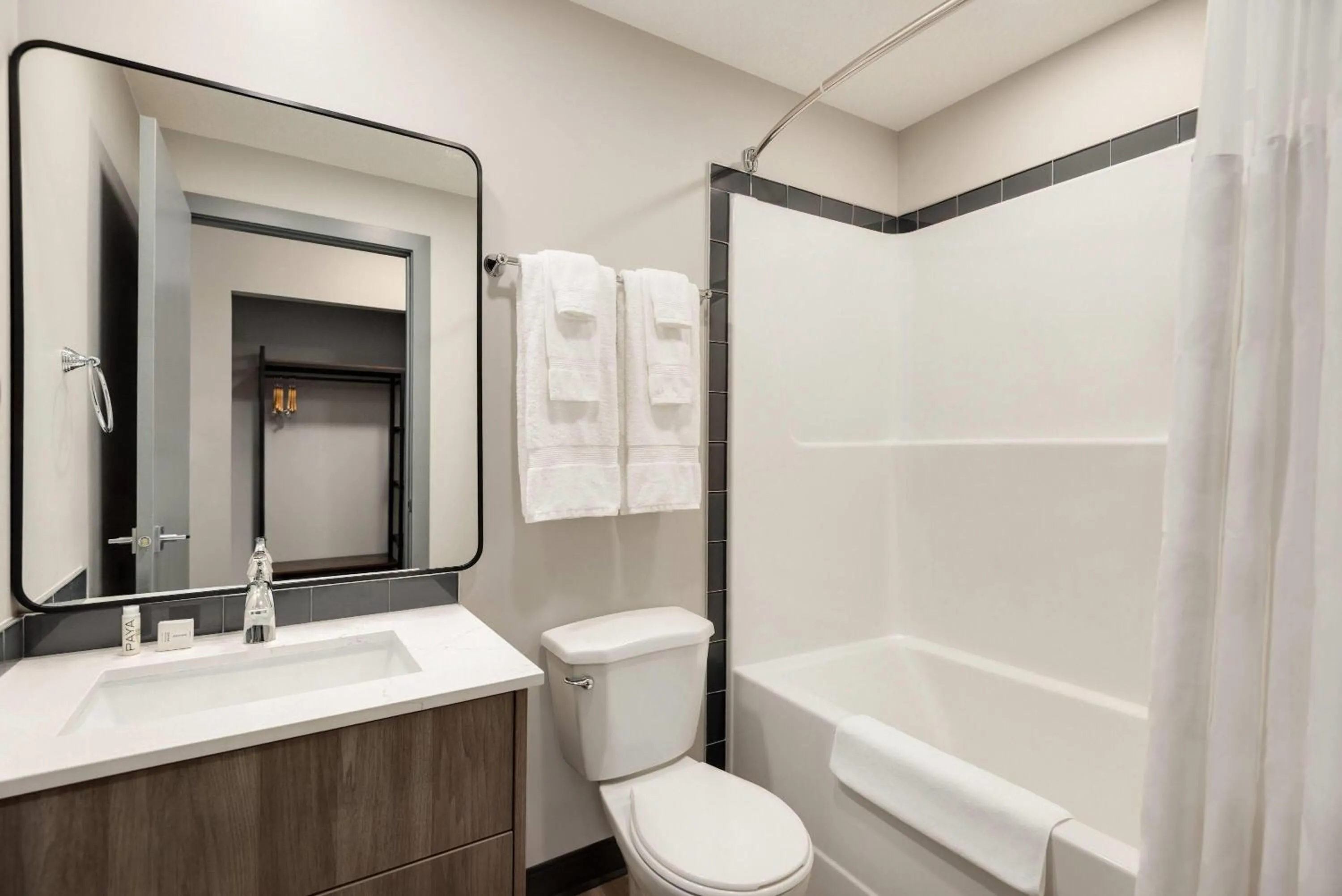 Bathroom in Ramada by Wyndham West Edmonton Hotel & Suites