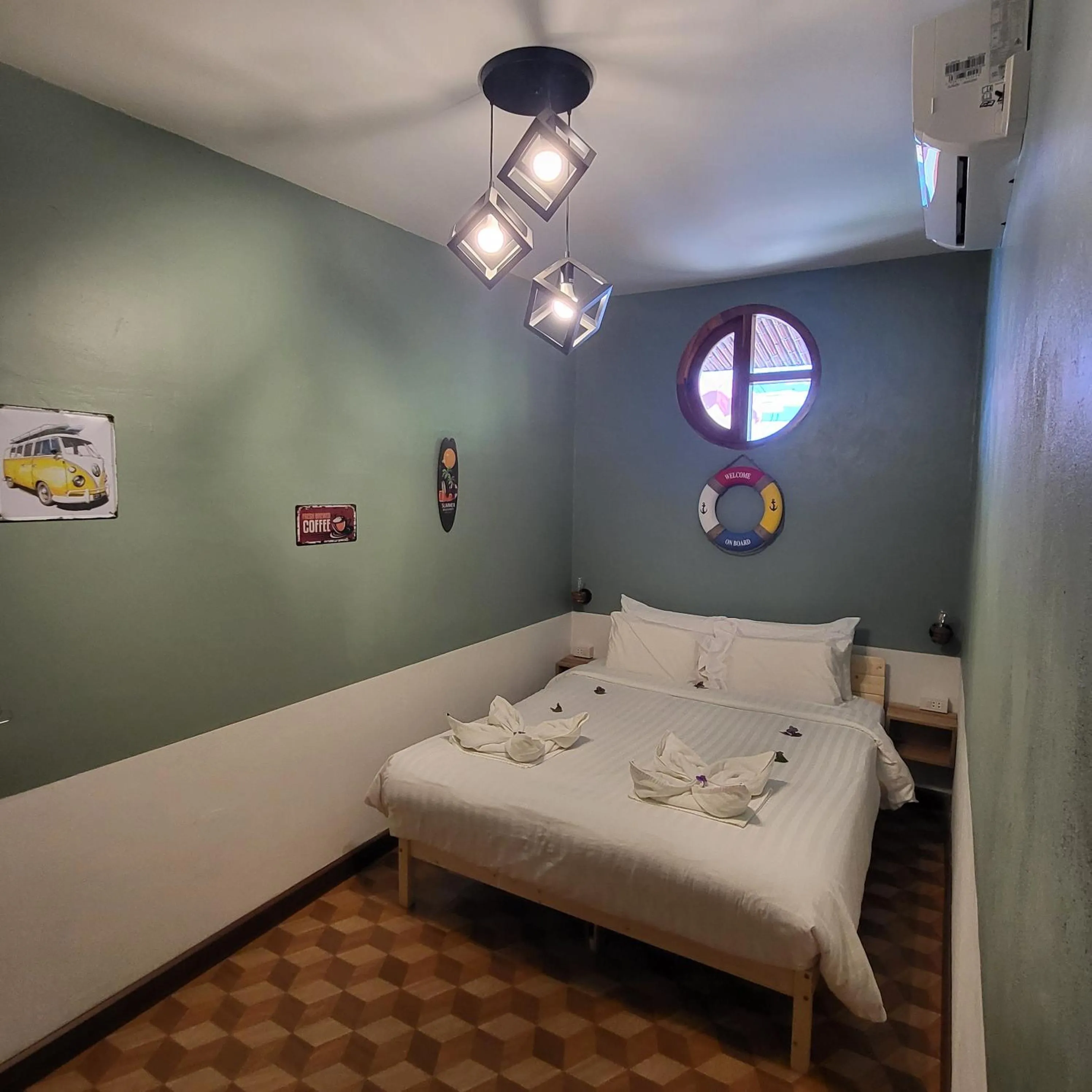 Bed in Namphung Phuket Boutique Resort